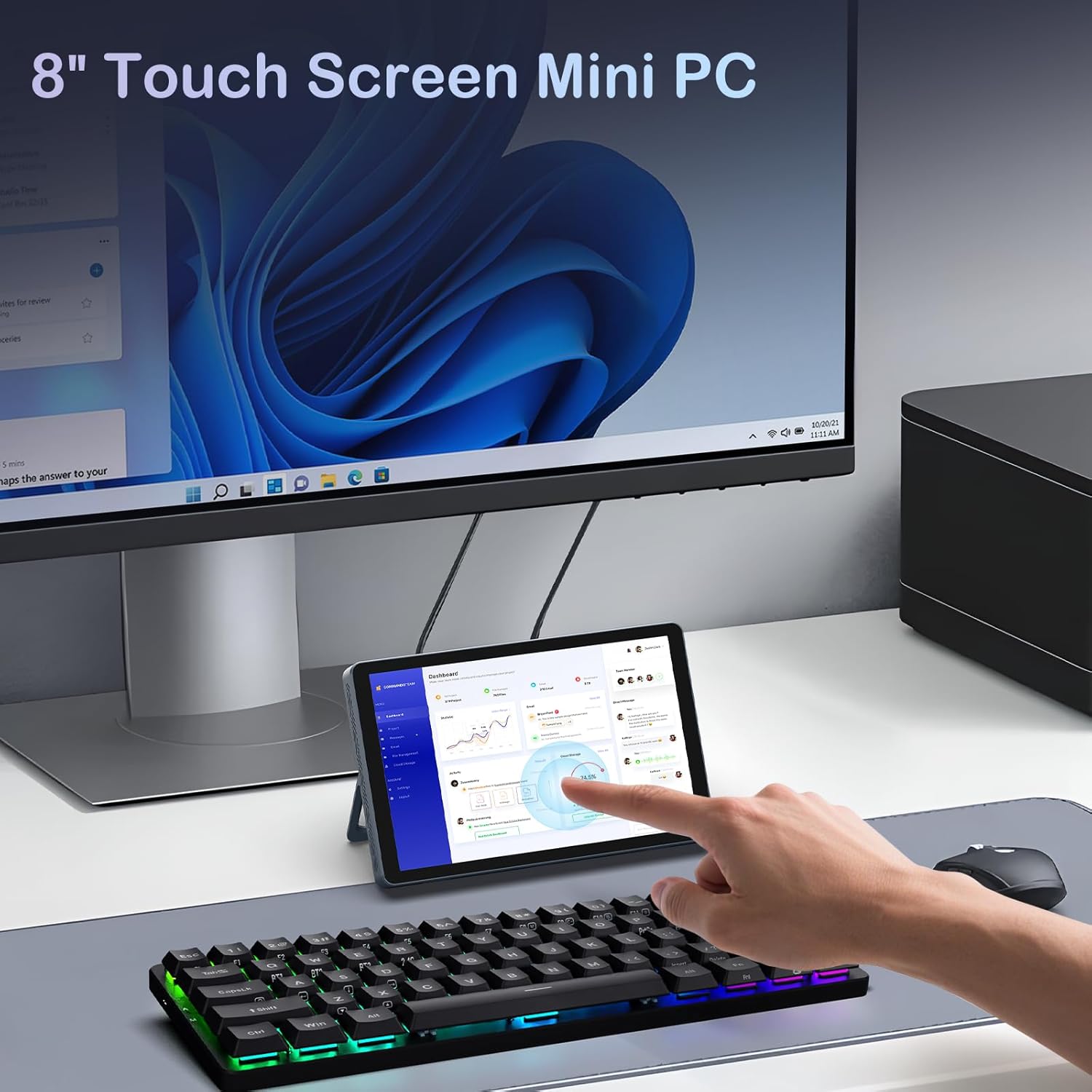KOOSMILE Mini PC N150 connected to an external monitor, with a user interacting with its touchscreen and an external keyboard and mouse.