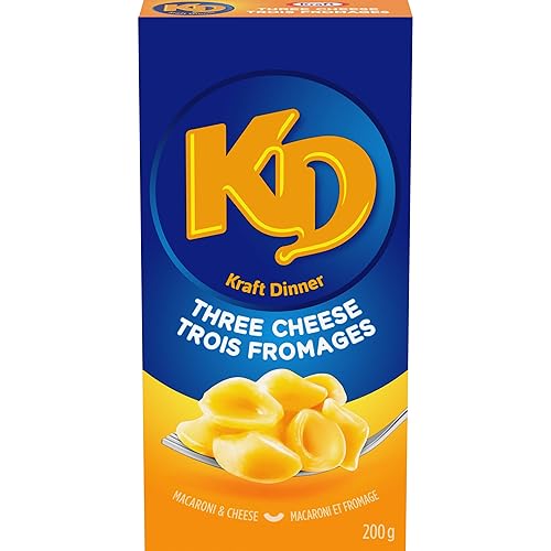 Kraft Dinner, Tres queso, macarrones y queso, 7.05 oz/7.1 onzas, (paquete de 24) {Importado de Canadá}