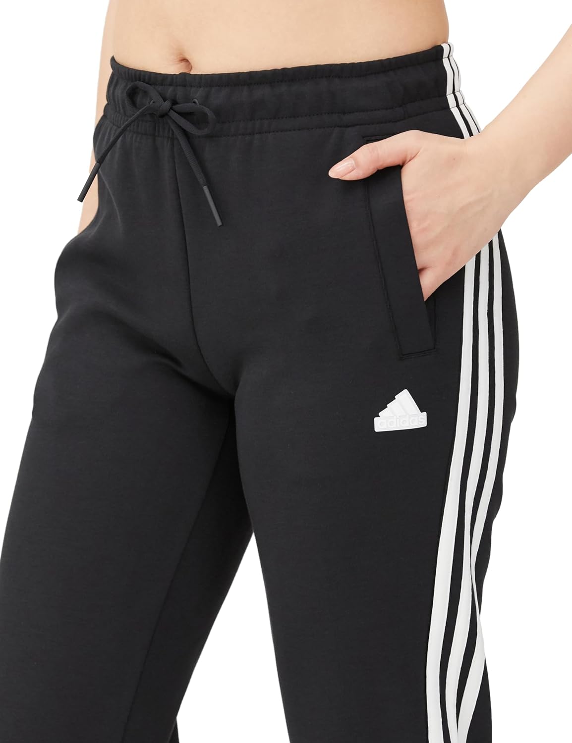 Close-up of Adidas KLT32 sweatpants waist with drawstring and pocket
