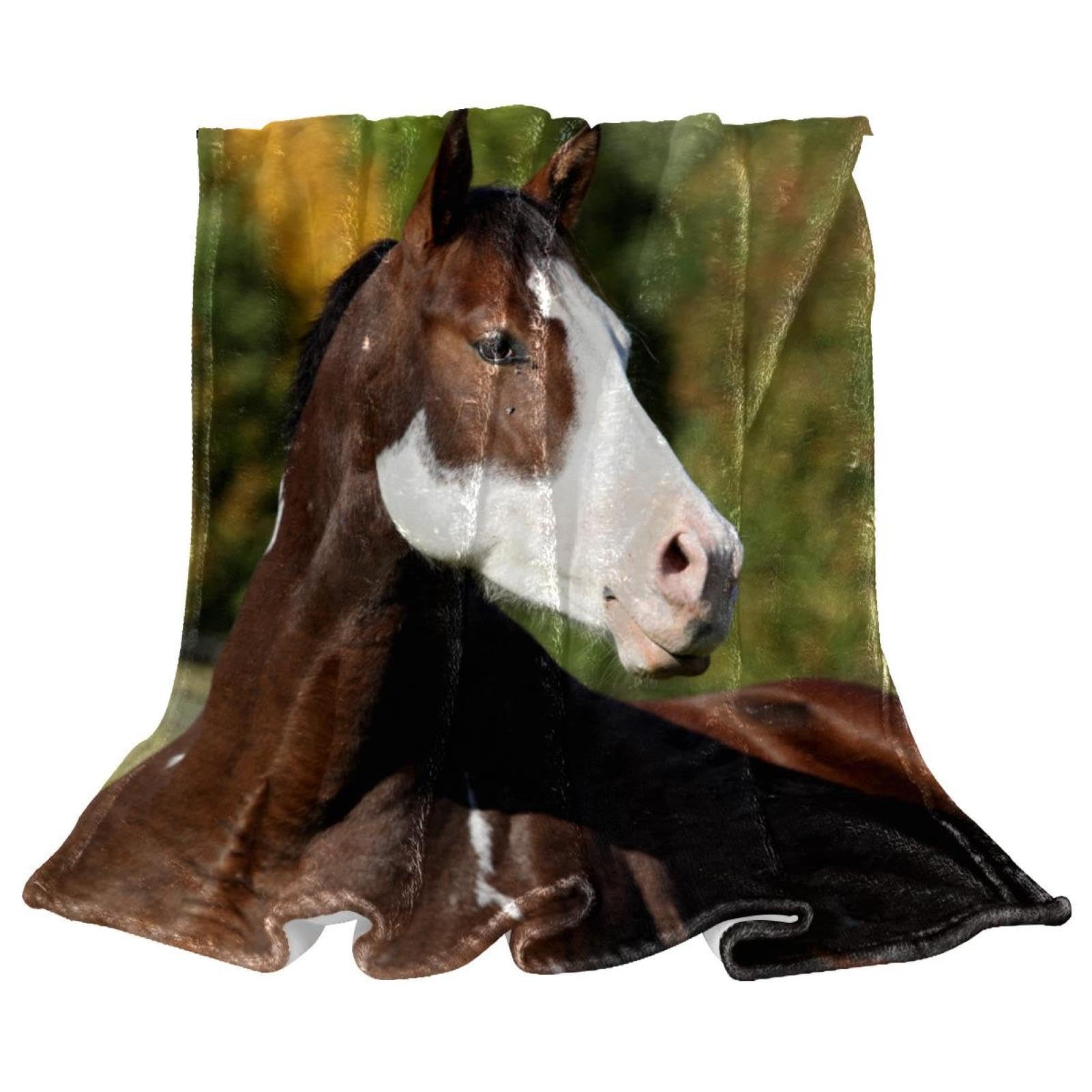 Couverture de canapé motif cheval marron pour des soirées cocooning au salon