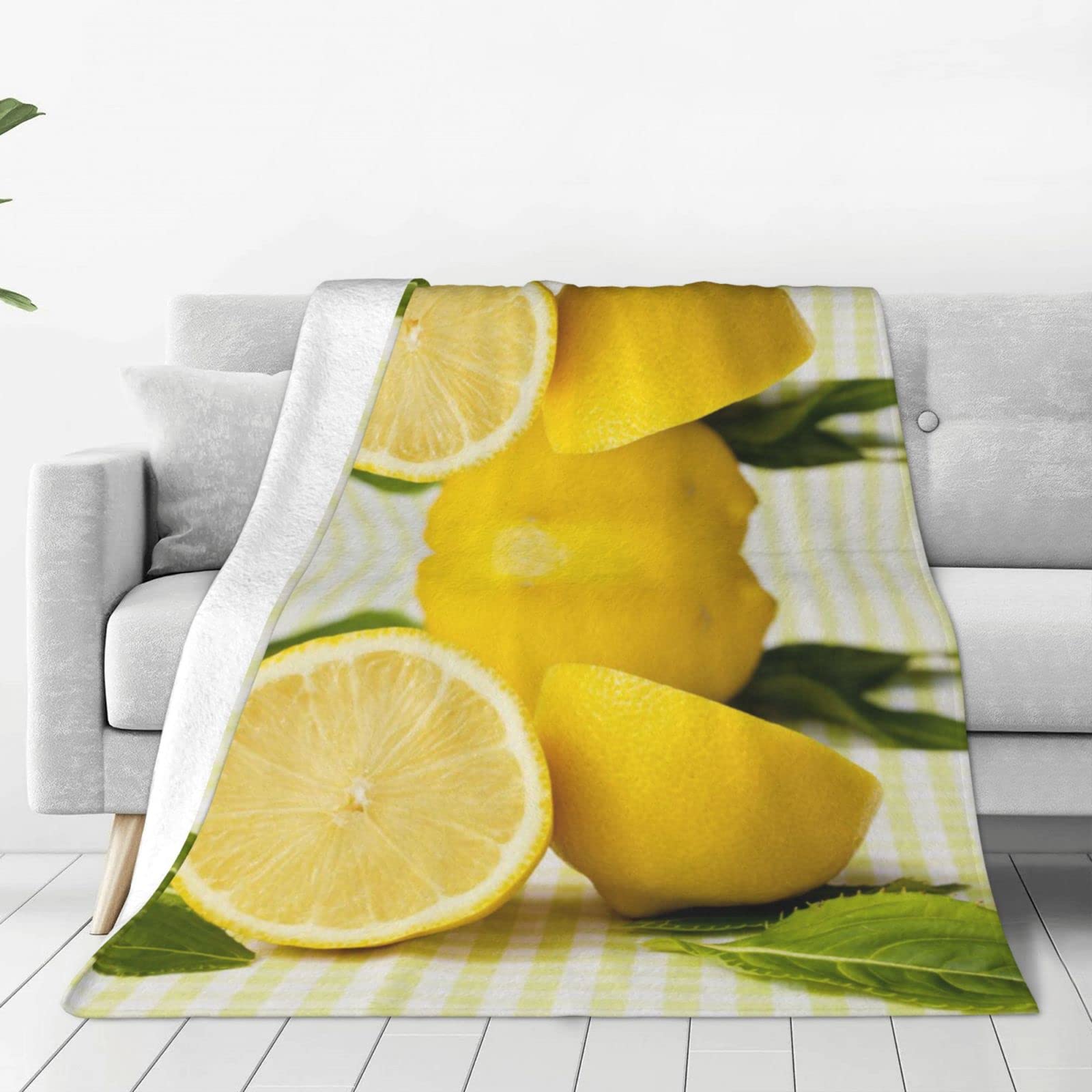 Couverture en flanelle douce jaune pour soirées cocooning sur le canapé et camping