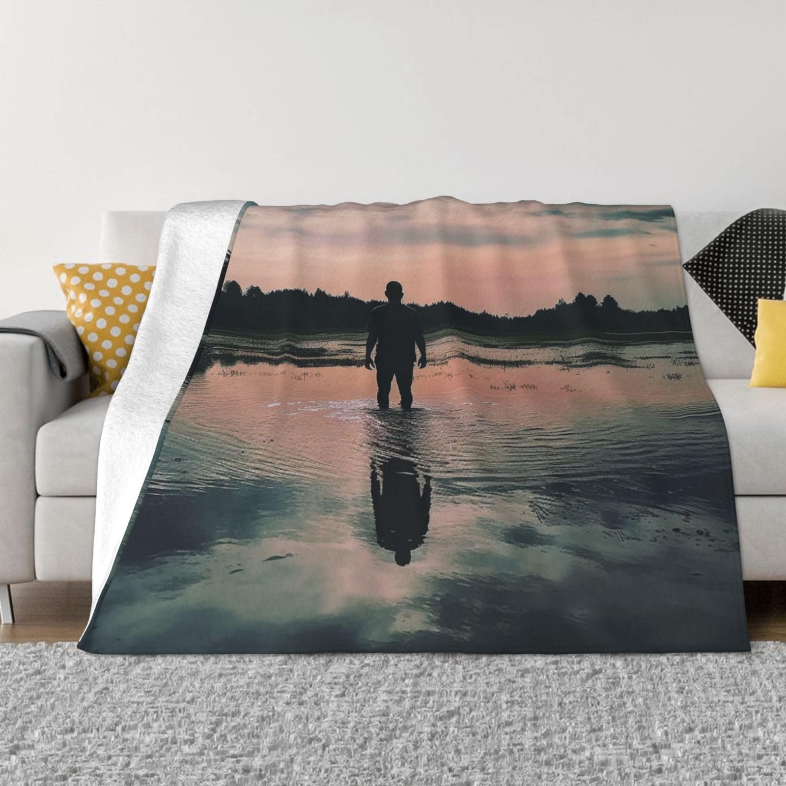 Couverture réversible motif lac pour vos soirées cocooning sur le canapé
