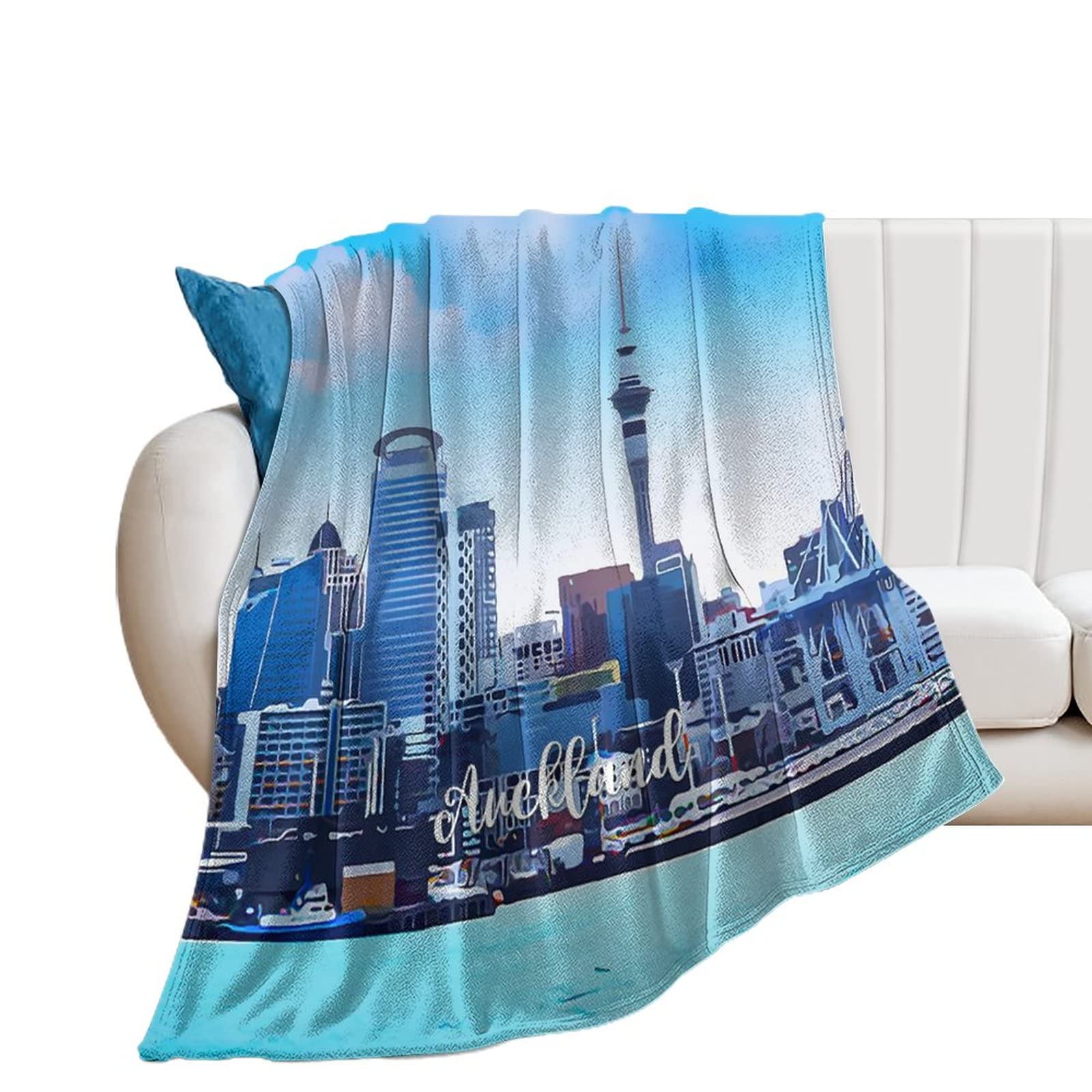 Couverture flanelle Auckland chaude et douce pour un confort thermique optimal sur le canapé