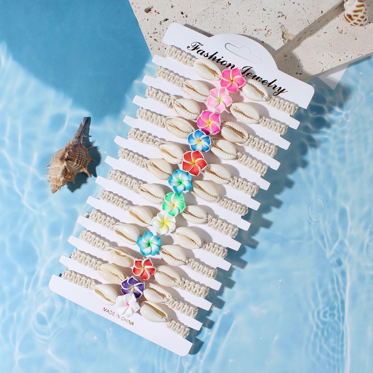 COLORFUL BLING 5 to 12 Pcs Hawaiian Plumeria Rubra Bracelets for Women Bohemian Shell Starfish Tropical Flower Charms Bracelet Set Handmade Braided Woven Rope Stretch Bracelets Summer Beach Jewelry - Image 3