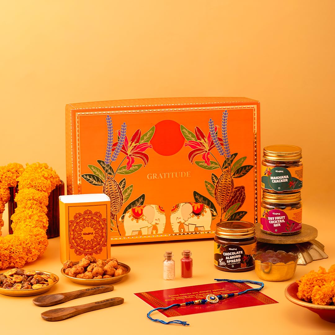 Gladful Premium 7 Items Rakhi Gift Box for Brother | Orange Elephant Hamper with Gourmet Snacks, Chocolate Spread, Rakhi & Greeting Card | Luxurious Raksha Bandhan Gift-image-44