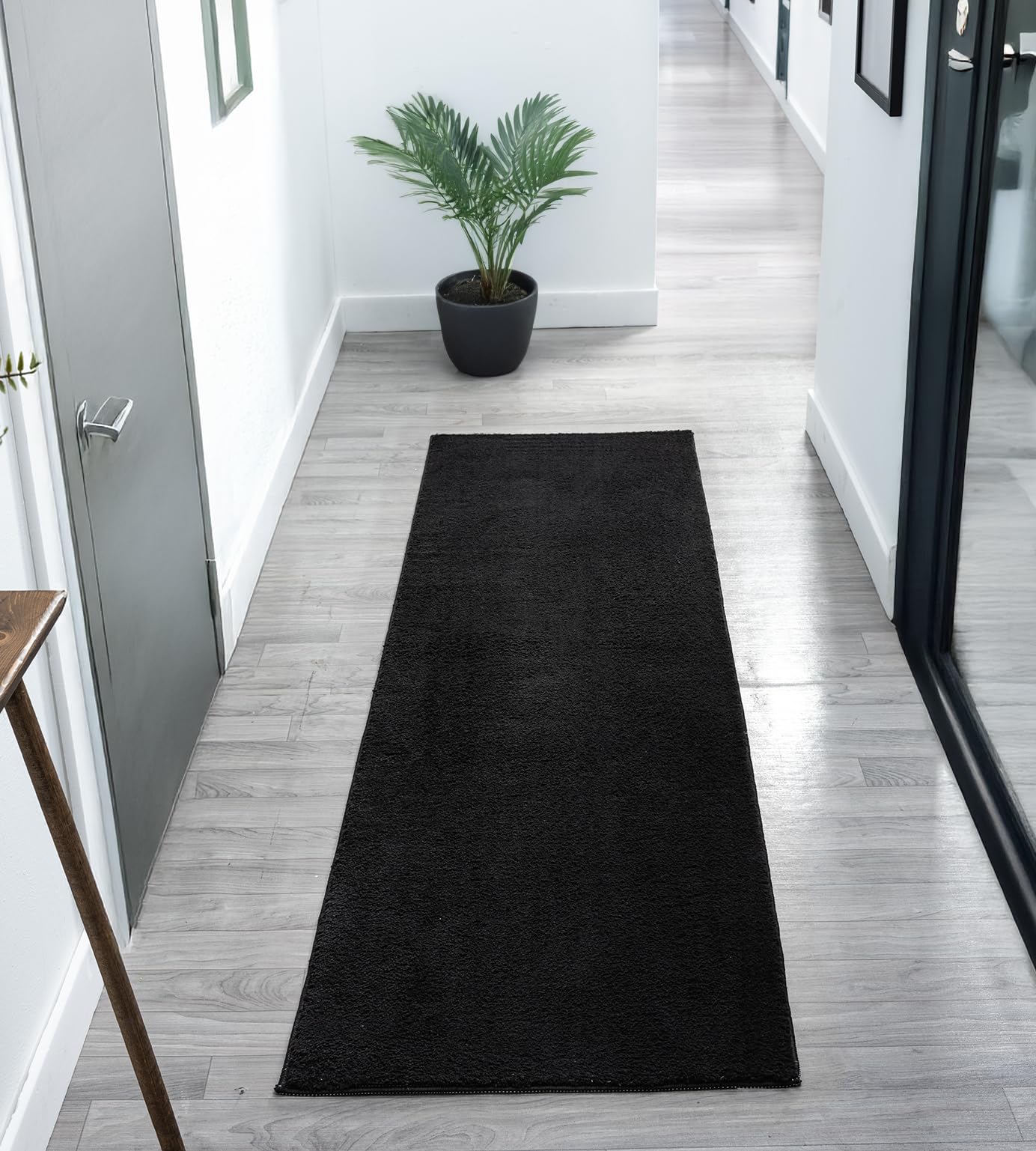 Comfy Washable Low Pile Living Room Area RugAnti-Slip Felt Backing Black 60Cm X 200Cm from B&Q