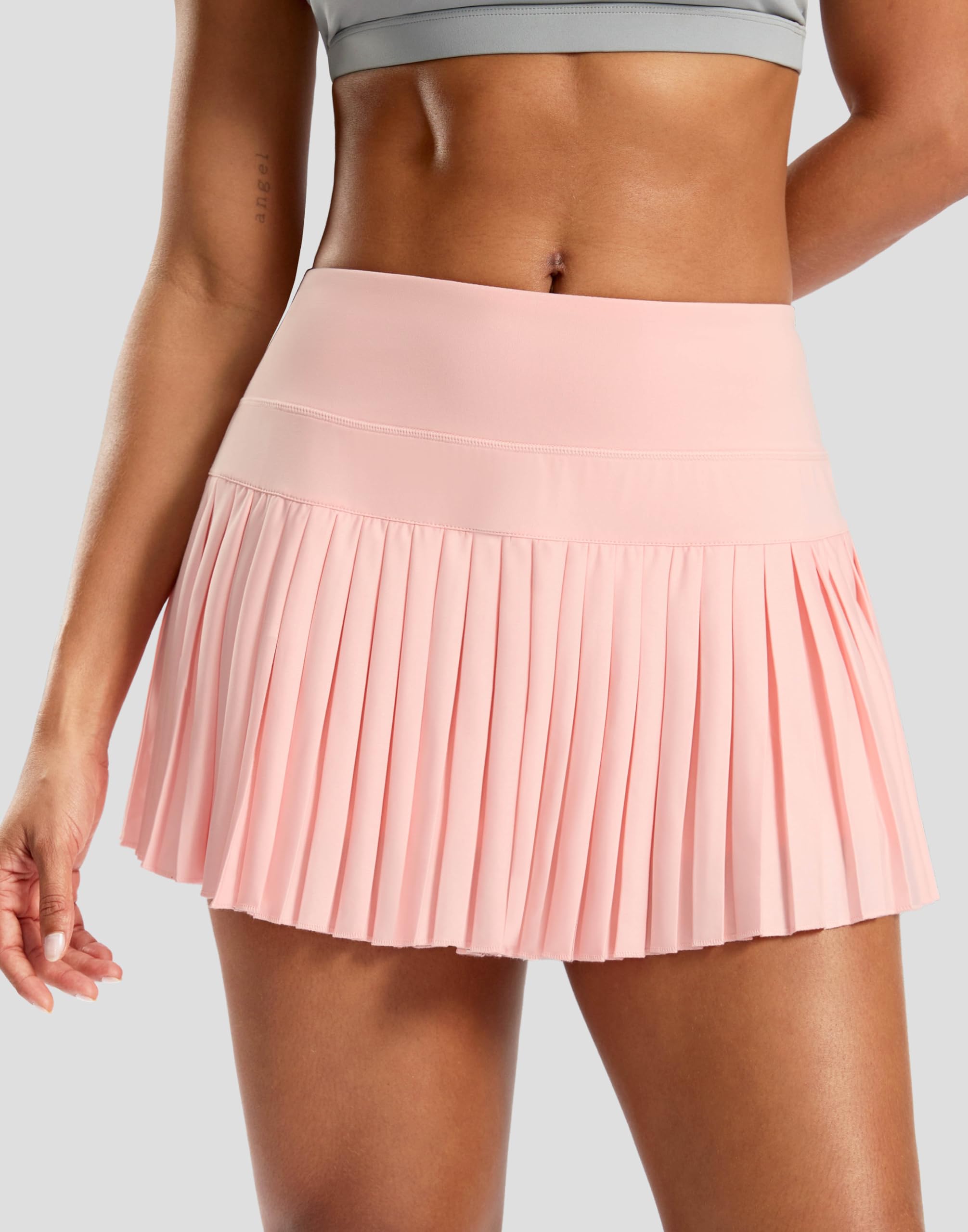 SANTINY Falda de tenis plisada para mujer con bolsillos, falda de golf atlética de cintura alta con pantalones cortos para entrenamiento, pickleball