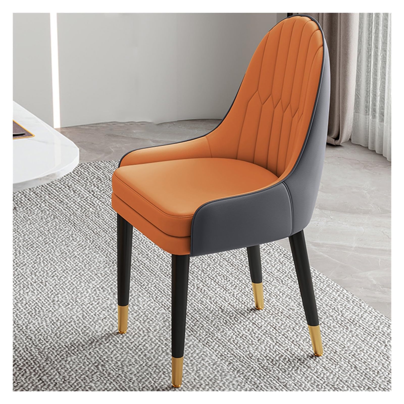 Chaise de salle à manger ergonomique orange contre le mal de dos en salon