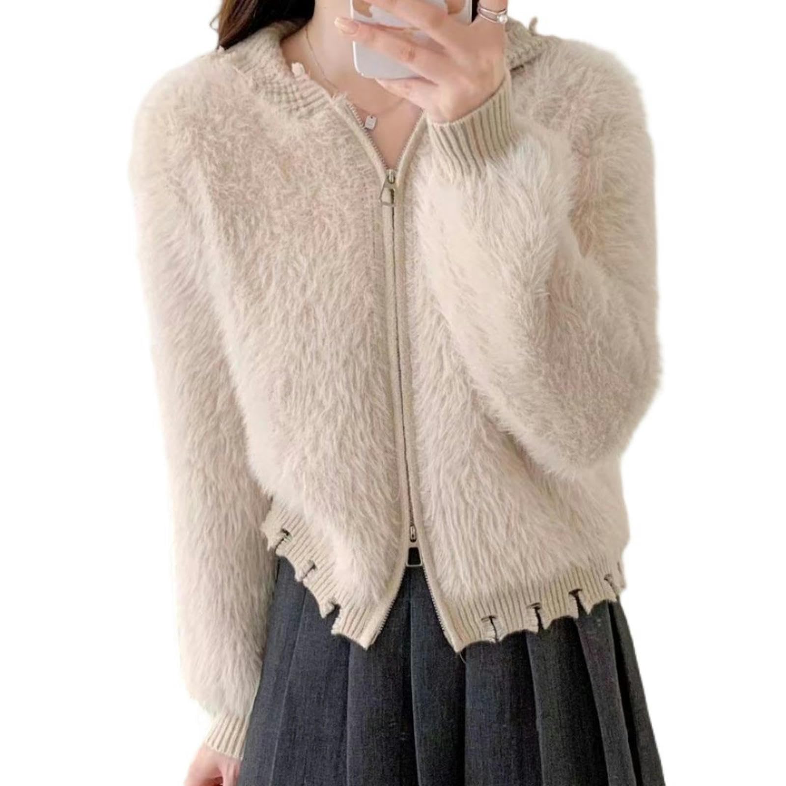 Pull à fermeture éclair doux couleur abricot pour affronter le froid avec style