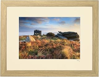 Mounted or framed photograph by Andrew Ray featuring Carn Brea Castle at sunrise on a misty morning in Cornwall.