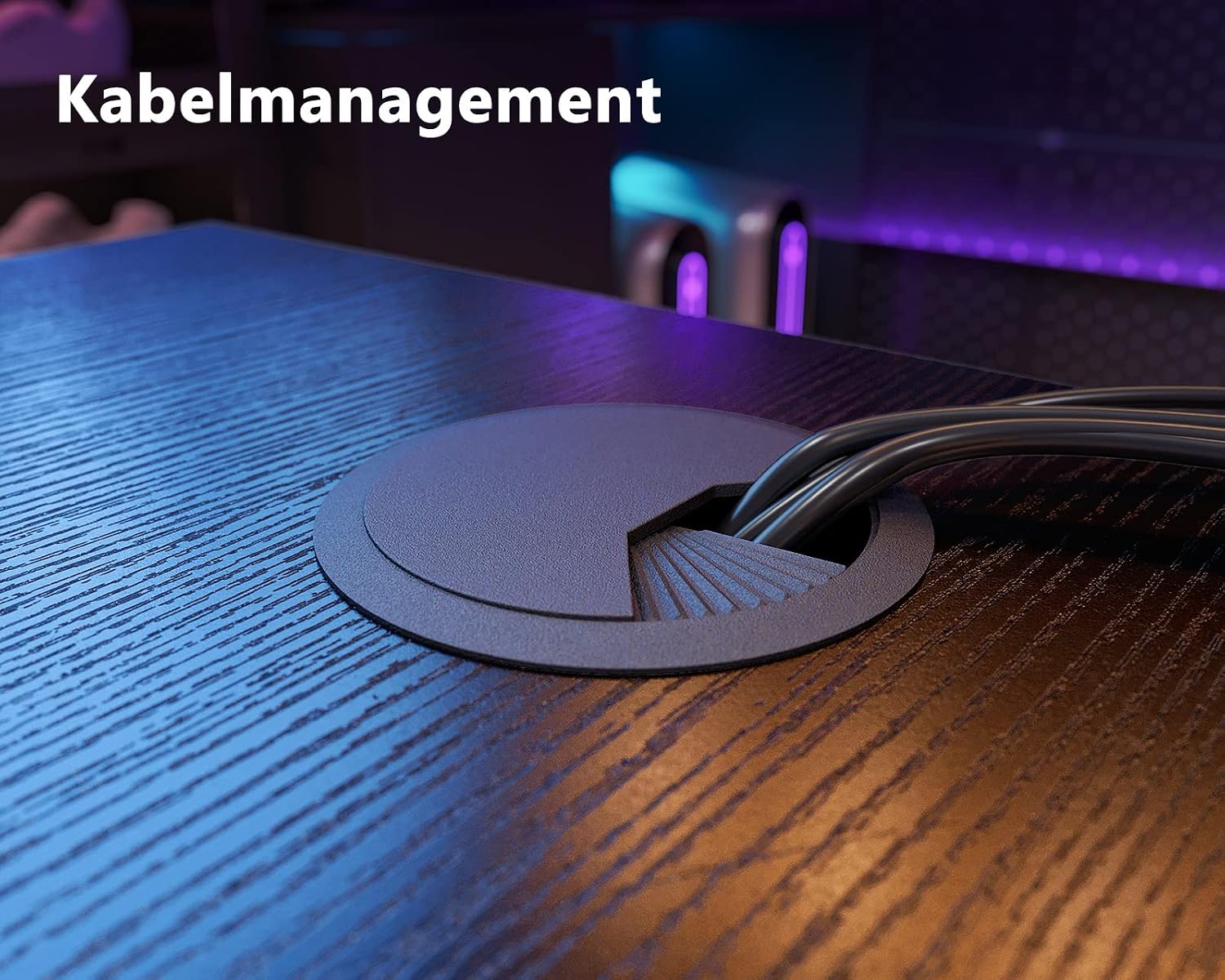 Cable management grommet on desk