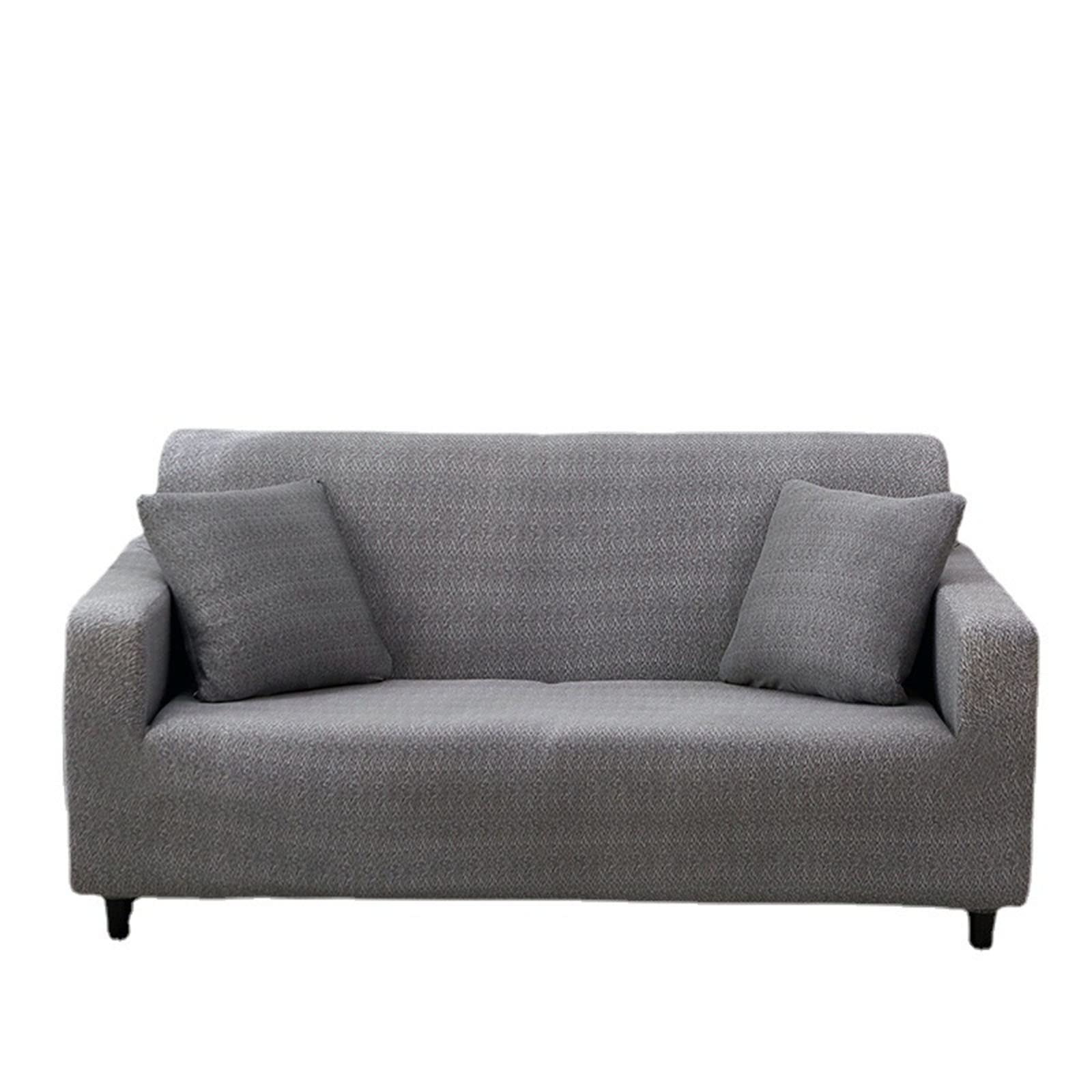 Housse de canapé extensible antidérapante couleur unie avec élastique de maintien