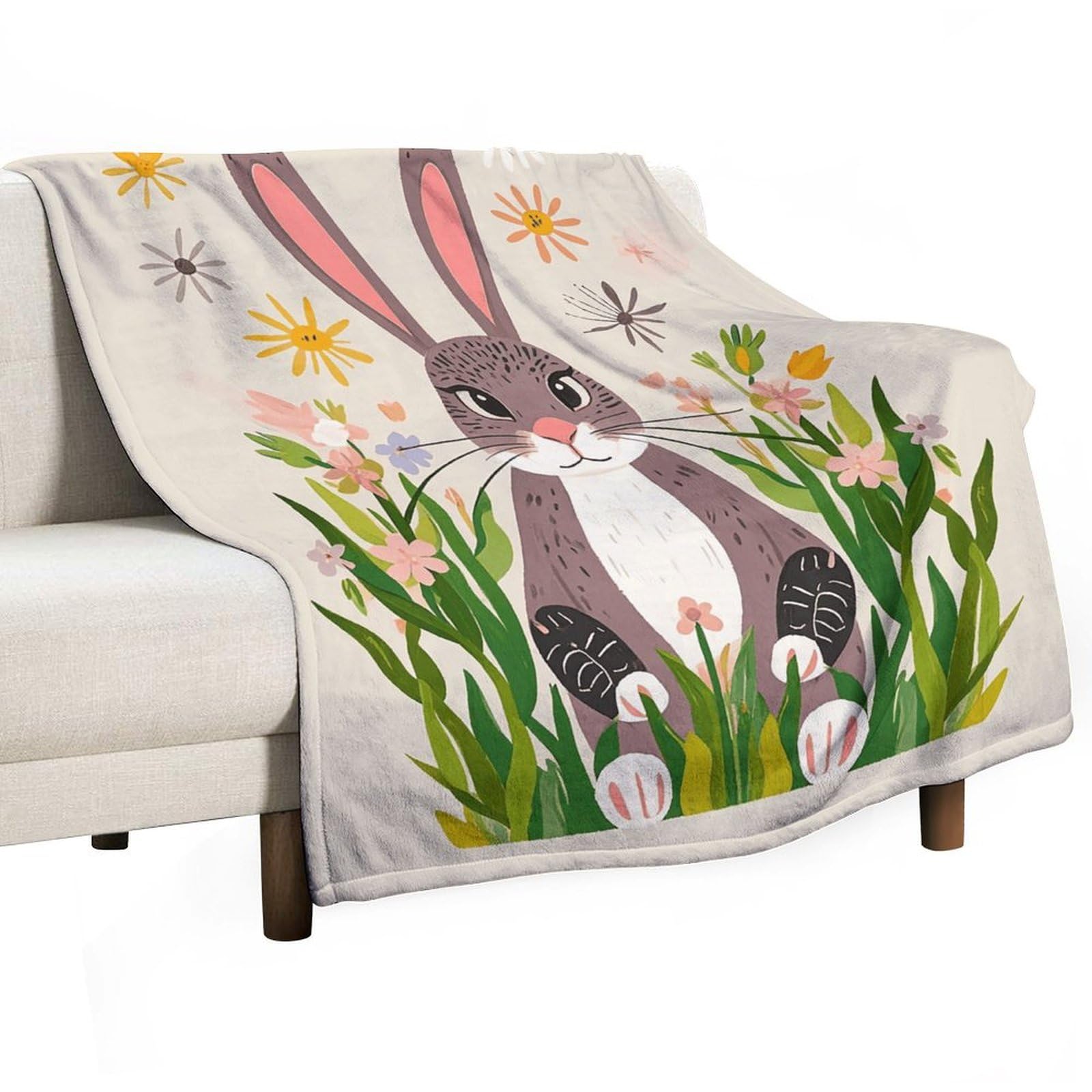 Couverture en polaire douce pour cocooning sur le canapé du salon en hiver