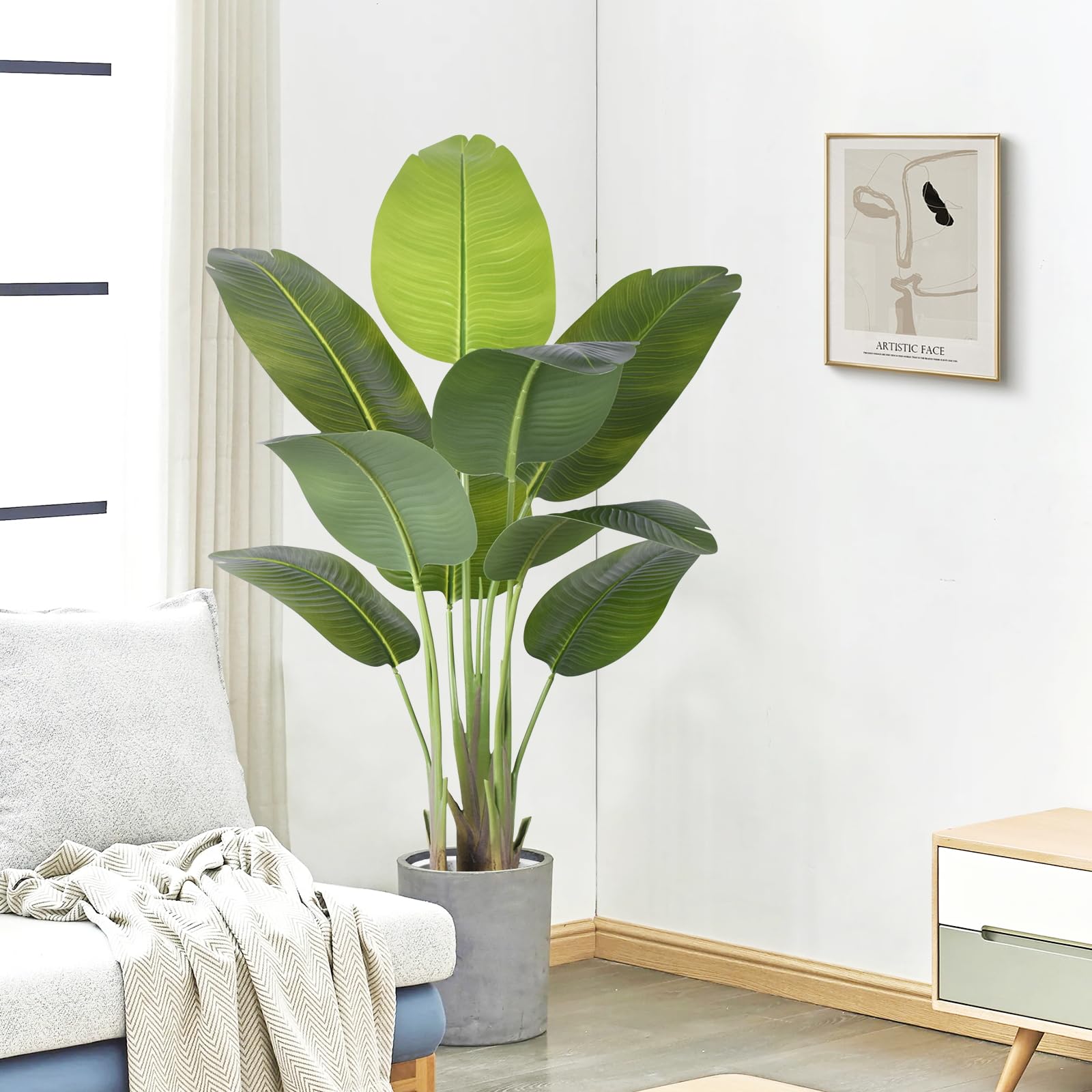ZEEOZE Artificial Bird of Paradise Plant 4Ft Tall Fake Tropical Palm Tree Large Fake Plants with 9 Silk Banana Leaves Faux Plant Indoor Decor Trees with White Pot for Home Bedroom Living Room Office 1