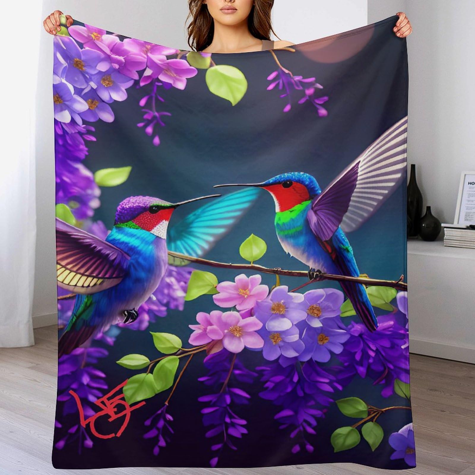 Couverture polaire Colibri plaid moelleux pour vos soirées cocooning devant le canapé
