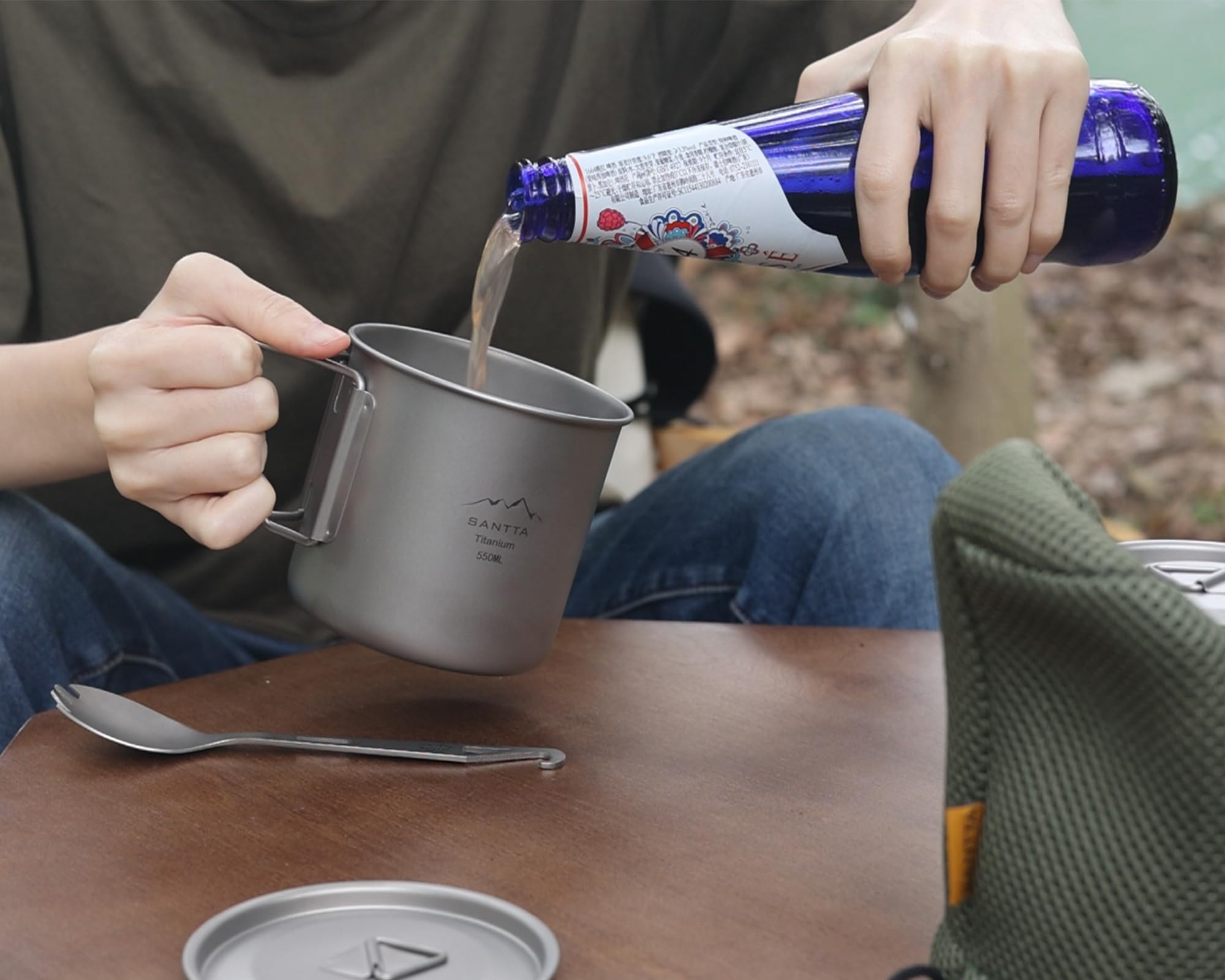 SANTTA Taza de campamento con tapa y bolsa, taza de titanio ultraligera de 550 ml con asa plegable, taza de camping