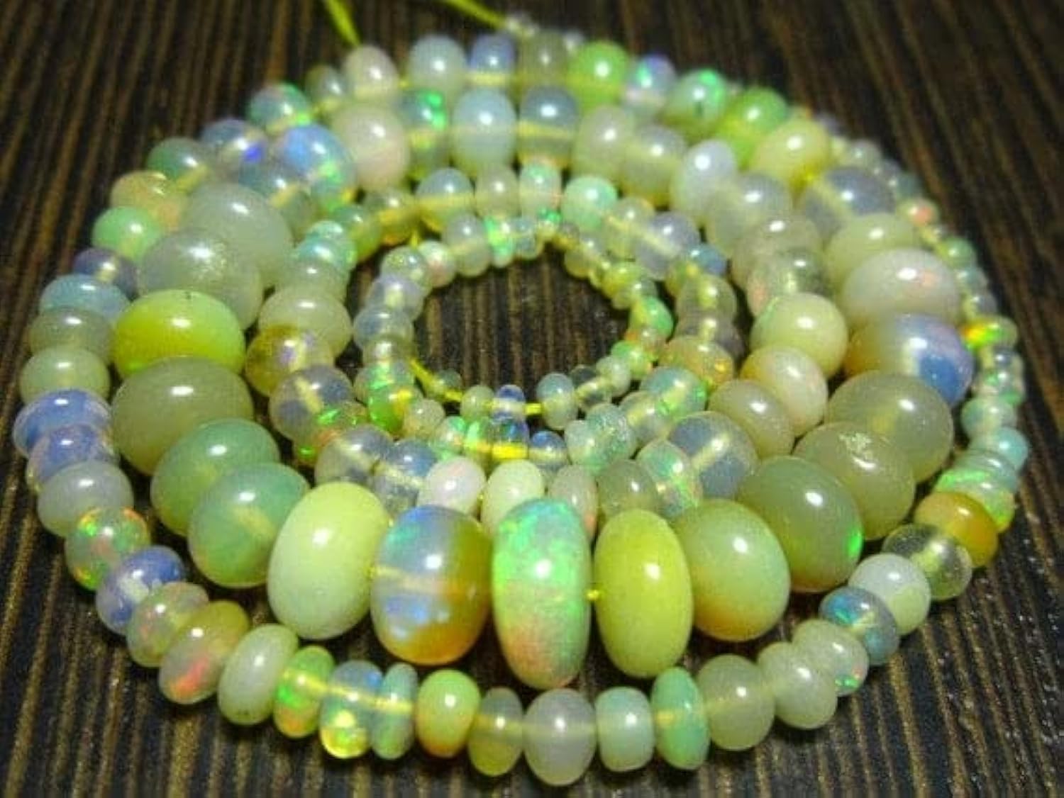 Opal Welo Ethiopian en rondelles lisses 2-6mm et fil 14" pour création de bijoux