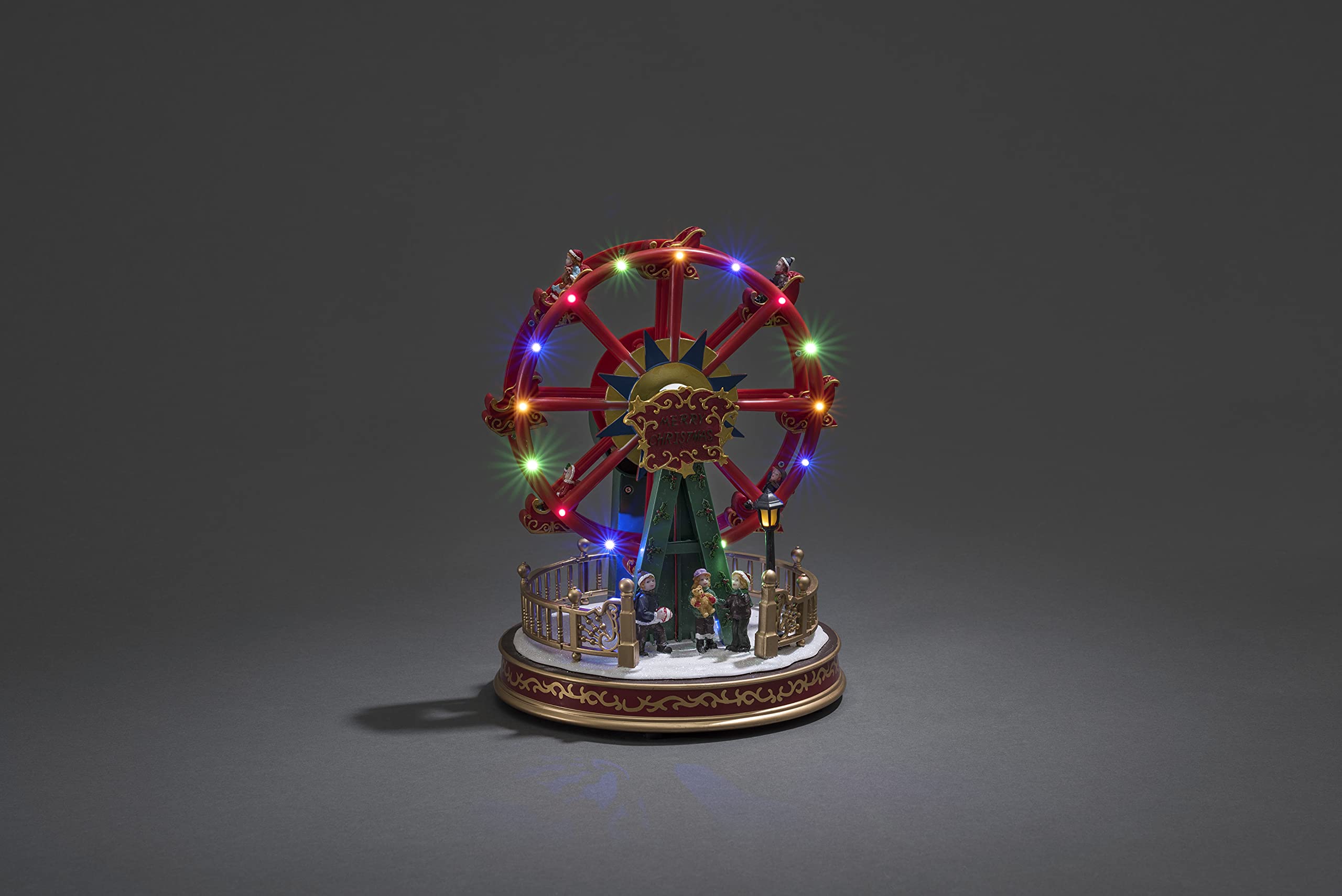 Konstsmide LED Szenerie Riesenrad mit Animation, 8 klassischen Weihnachtsliedern, wählbare Energieversorgung, 12 bunte Dioden, 4.5V Innentrafo/batteriebetrieben, Innen, transparentes Kabel - 3440-000