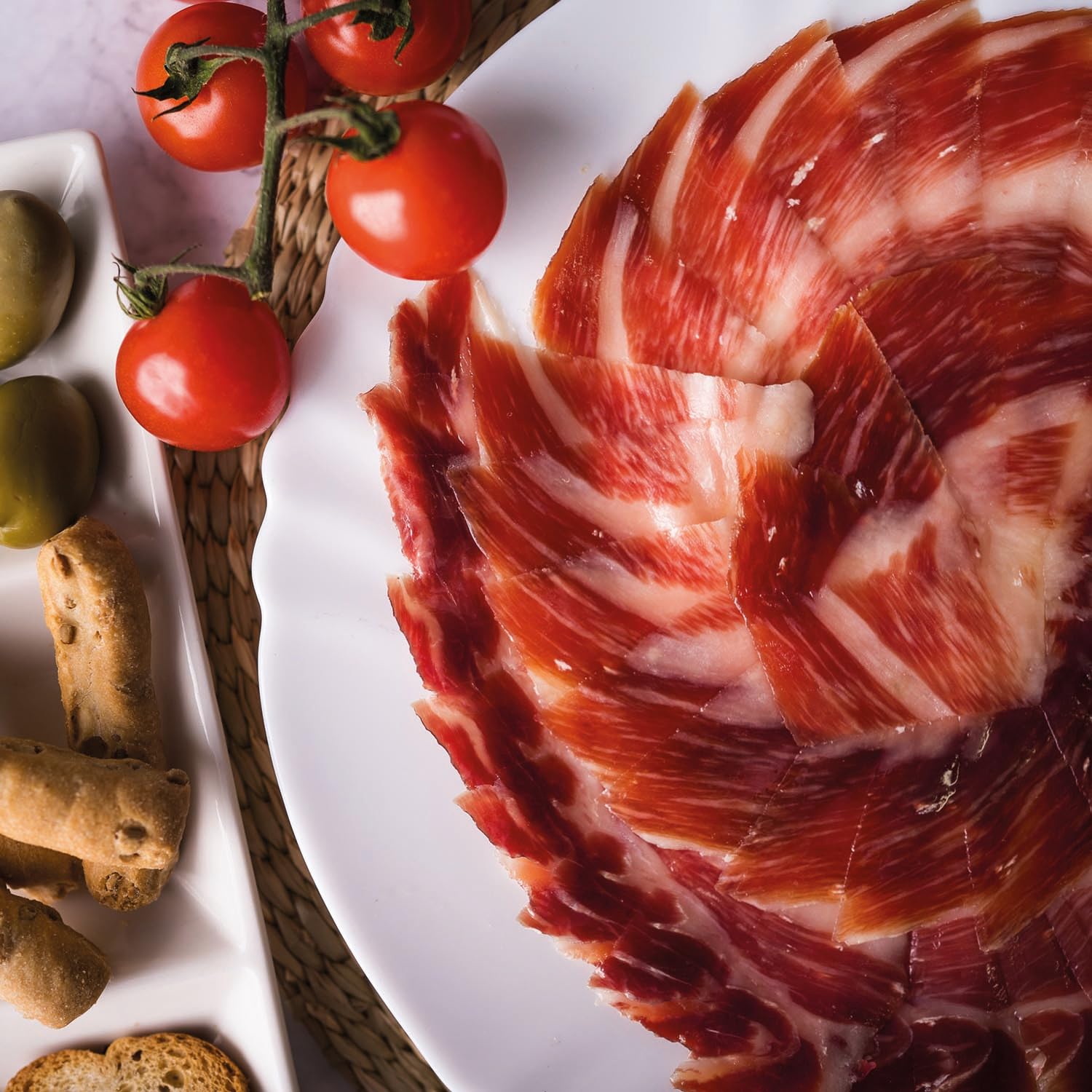 ENRIQUE GARCÍA - Jamón de Cebo Ibérico 75% Raza Ibérica, 10 Sobres Envasados al Vacío de 100 g Aprox. Acabado plástico. Caja regalo de cartón. Corte a máquina.