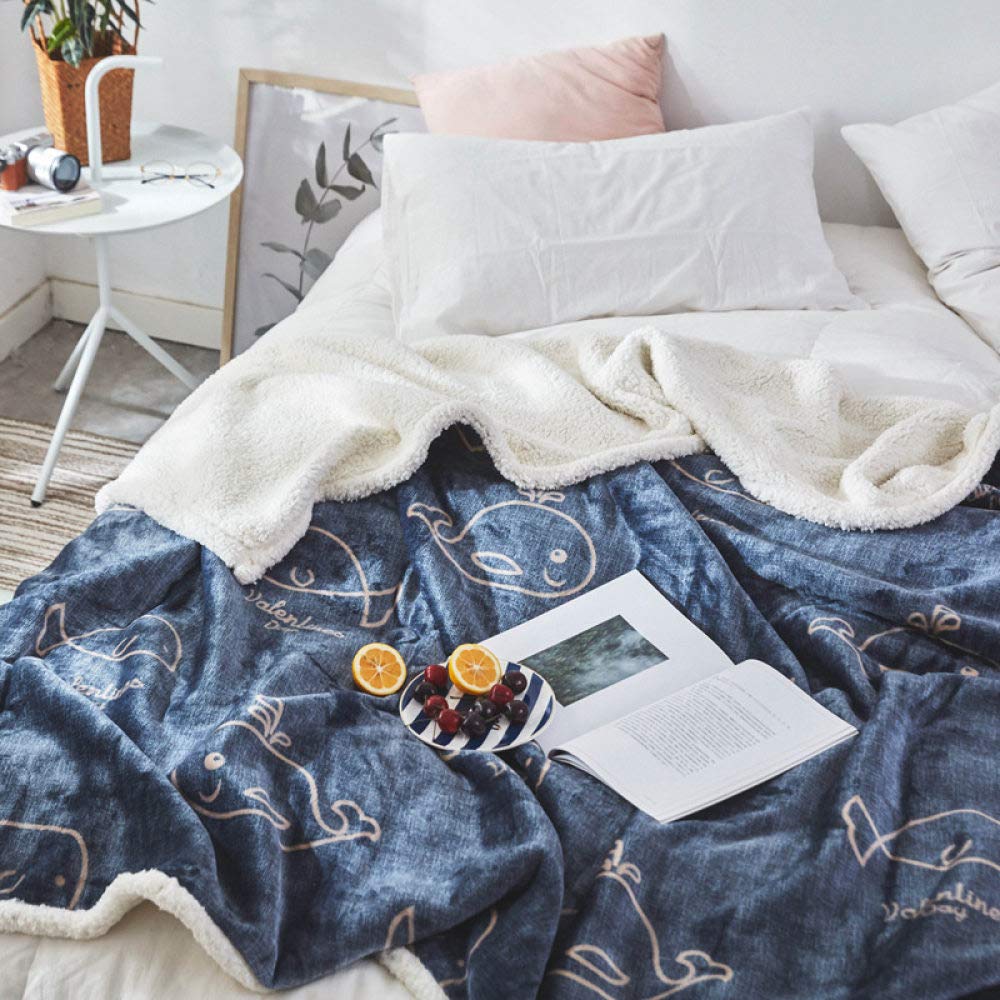 Couverture Sherpa douce pour une pause déjeuner cocooning au bureau