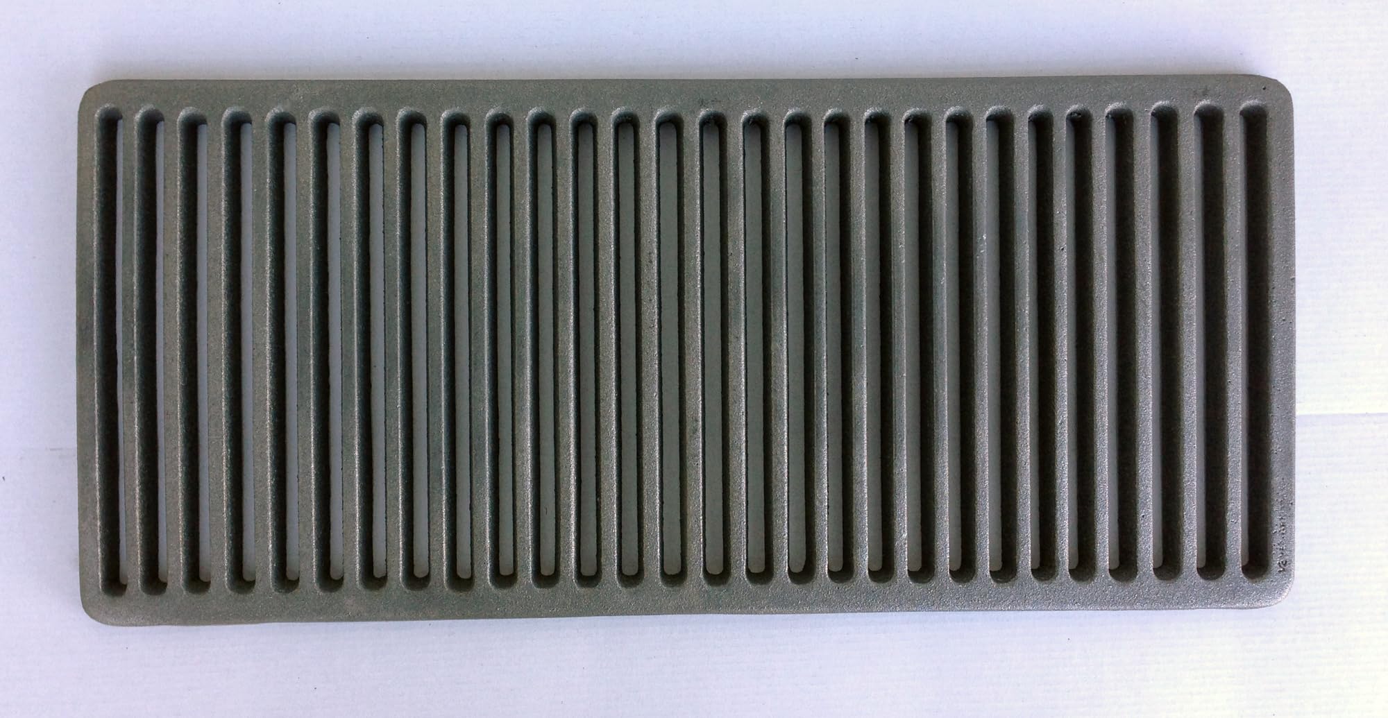 Griglia cenere 23x52 cm in ghisa per camino