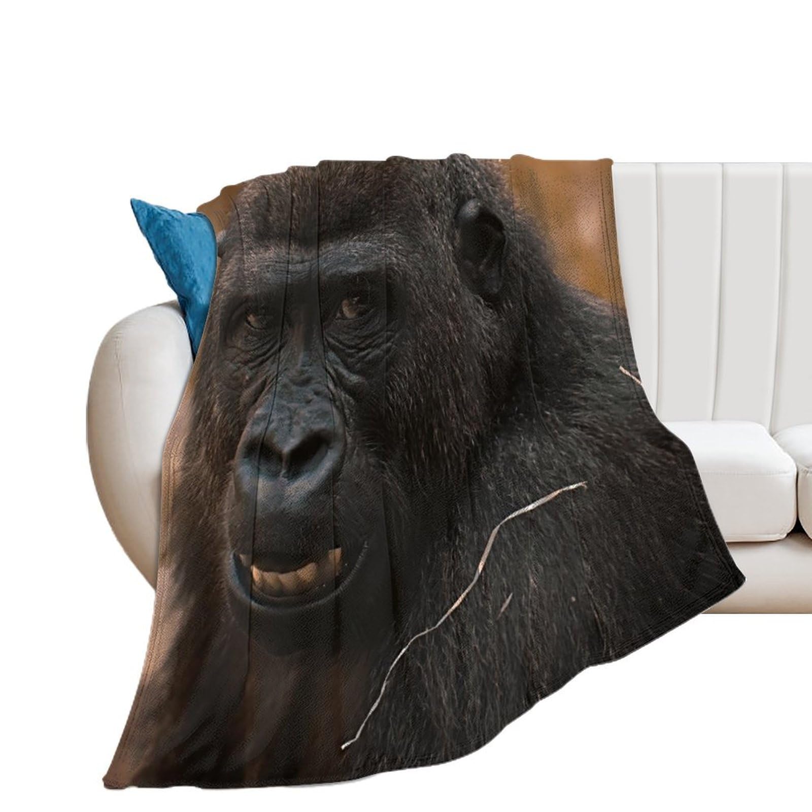 Couverture polaire orang-outan pour des soirées cocooning chaleureuses au salon