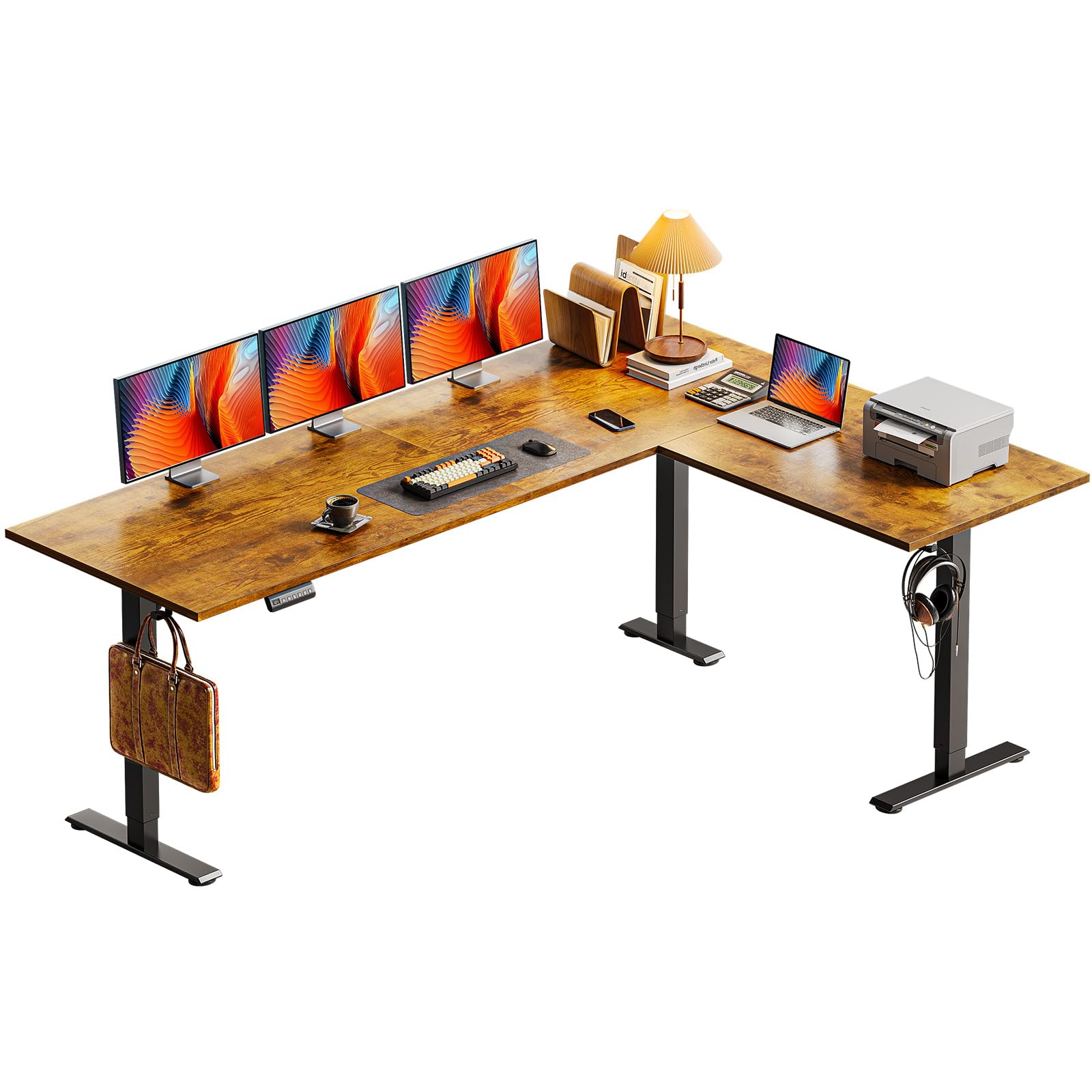 A person standing at the Casaottima 71 Inch Reversible Electric L Shaped Standing Desk, which is set up with multiple monitors and a laptop in a home office environment.