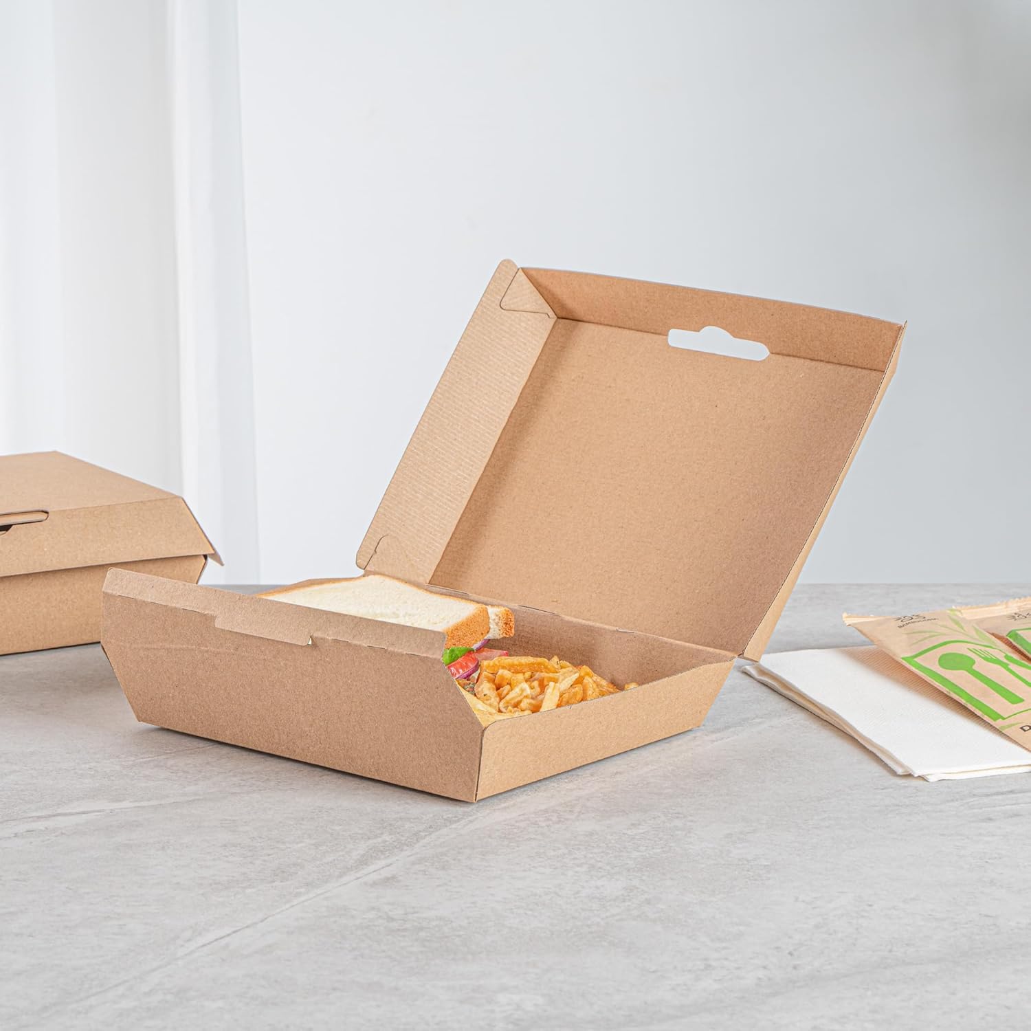 Restaurantware Clamshell Take Out Container 100 Pack of 7.9 x 5.9 x 2.8 Inch Paper Sustainable Take Out Box Grease-Resistant Food Box Kraft Burgers and Sandwiches Container