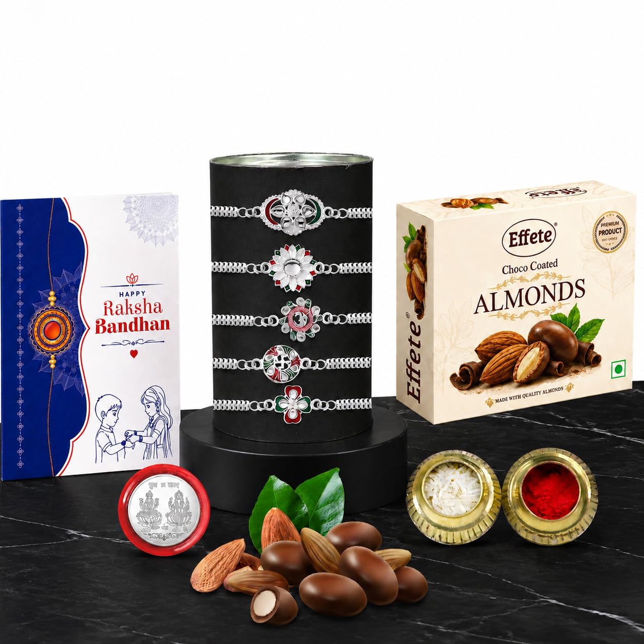 Vacalvers Chocolate with Rakhi Combo for Brother – Silver Color Red Green Mina Rakhi (5 Pc) with Silver Color Pooja Coin & Greeting Card, Choco Coated Almonds (32 Gm), Raksha Bandhan Celebration Combo