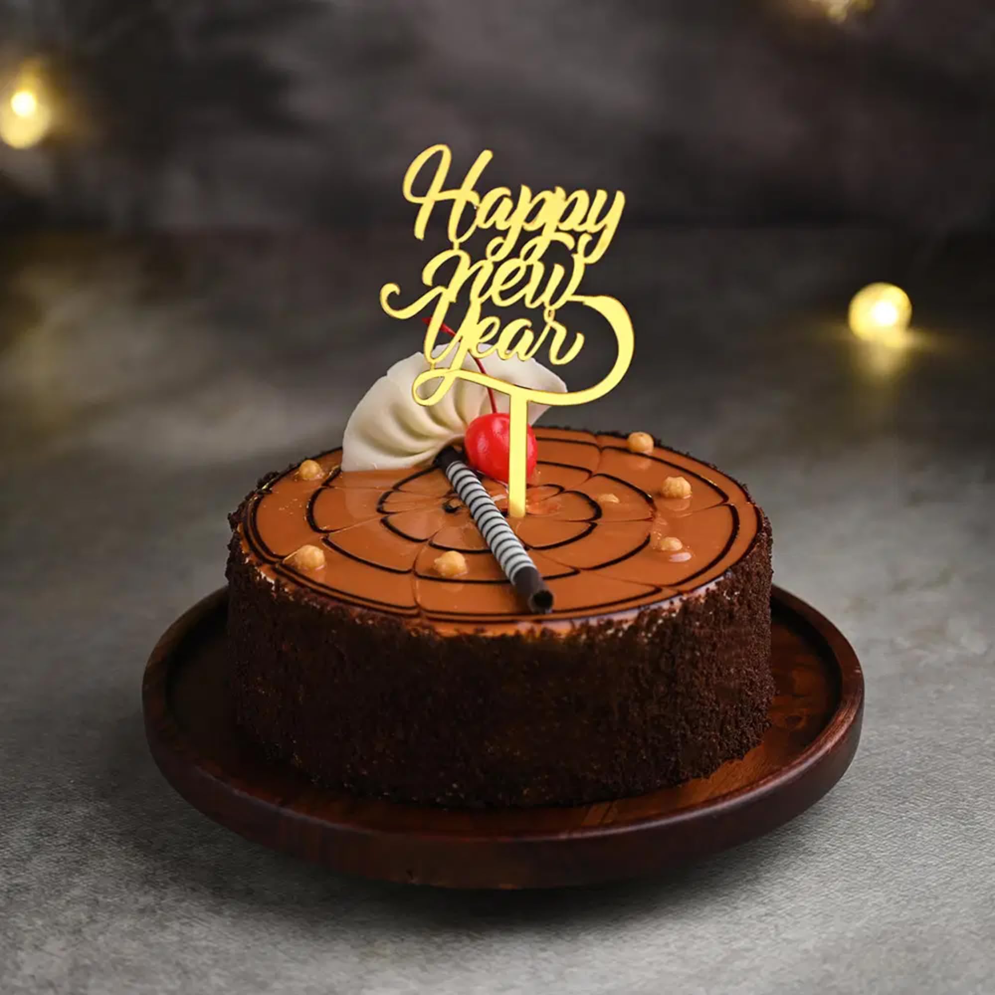 Bakingo New Year Special Fresh Yummy Butterscotch Eggless Cake With Topper | New Year Celebration Cake | 2025 Celebrations Cake | New Year's Eve Cake | Party Cake (Same Day Delivery) (1Kg)-image-37