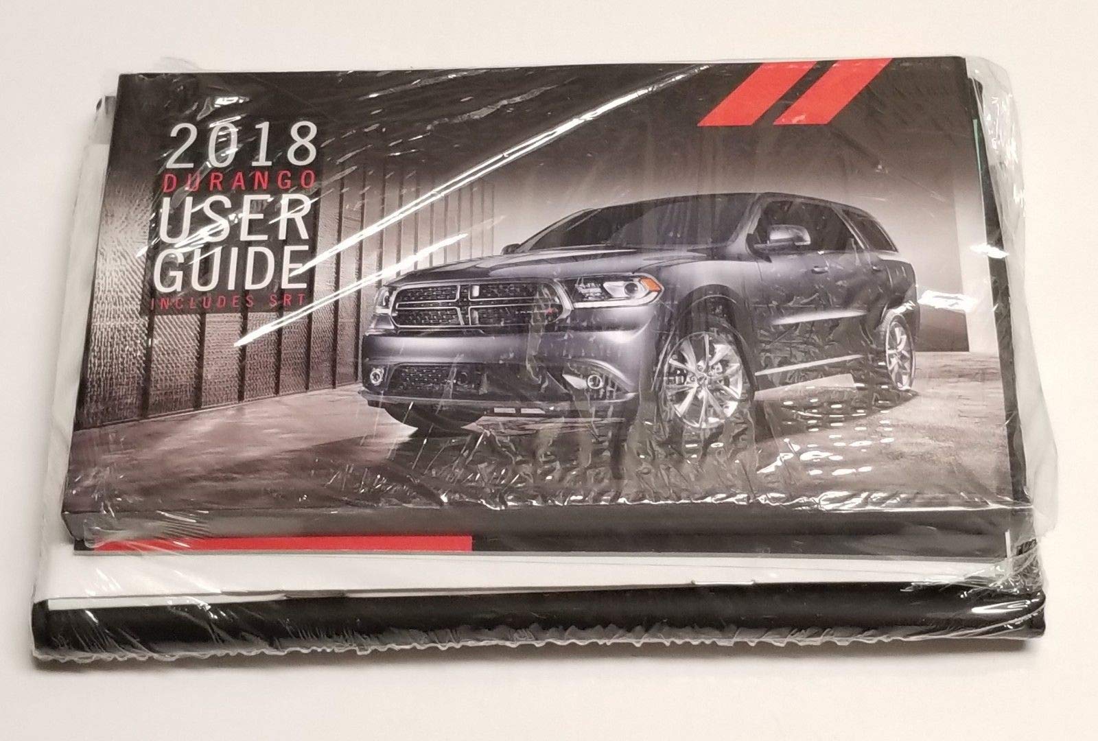 Cover of the 2018 Dodge Durango Owner's Manual, showing a gray Dodge Durango SUV.