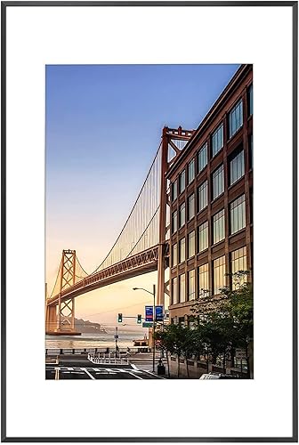 Frametory, Marco de fotos de aluminio de 16 x 24 pulgadas, marco negro de 16 x 24 pulgadas con paspartú de color marfil para fotos de 12 x 18