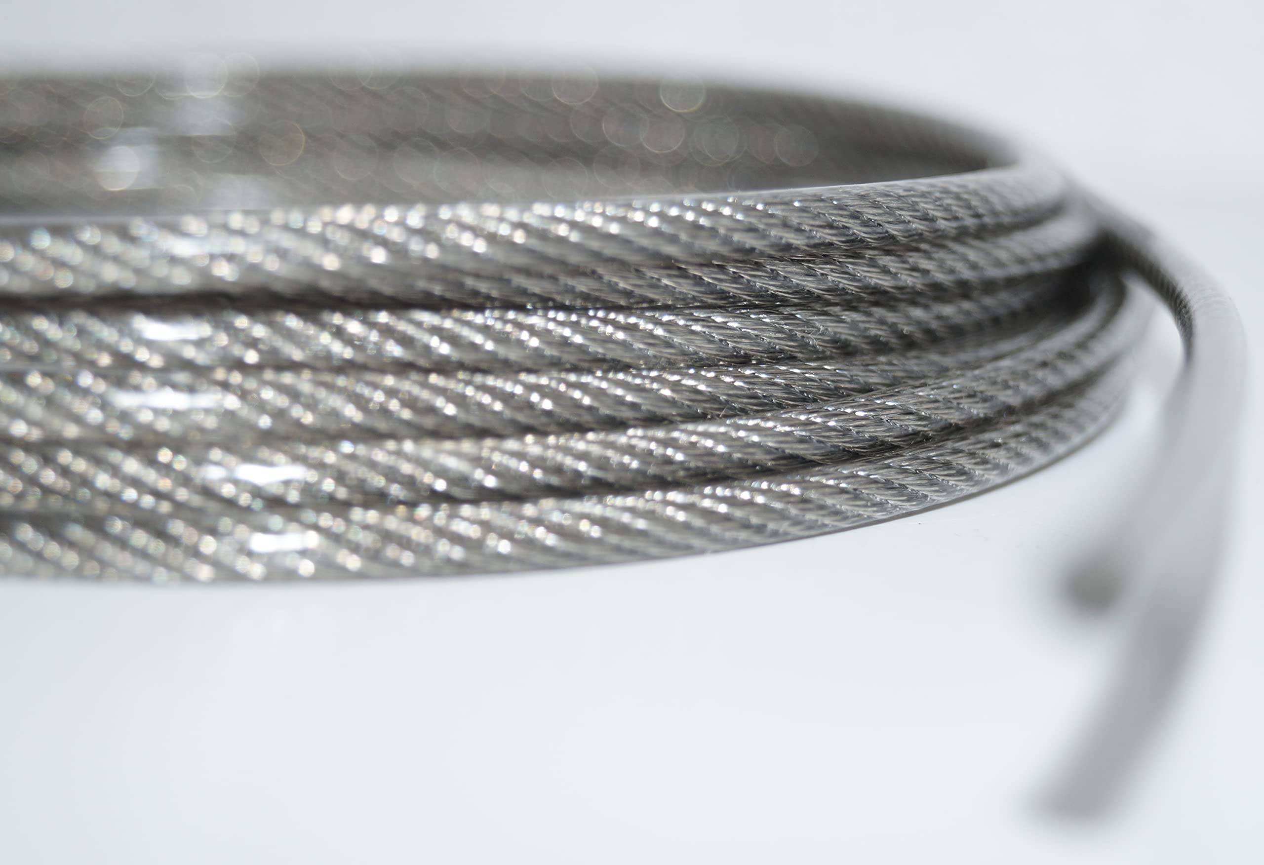 Nirosta Cable de alambre de 3/4 mm, 25 m, 3/4 mm, acero inoxidable, 7 x 7, recubierto de PVC transparente, EN 1.4401 dureza media A4