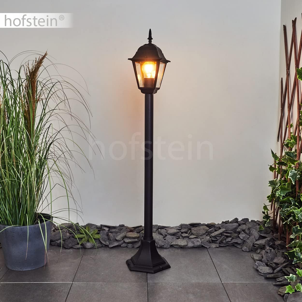 Hofstein Naofe outdoor lamp installed in a garden setting