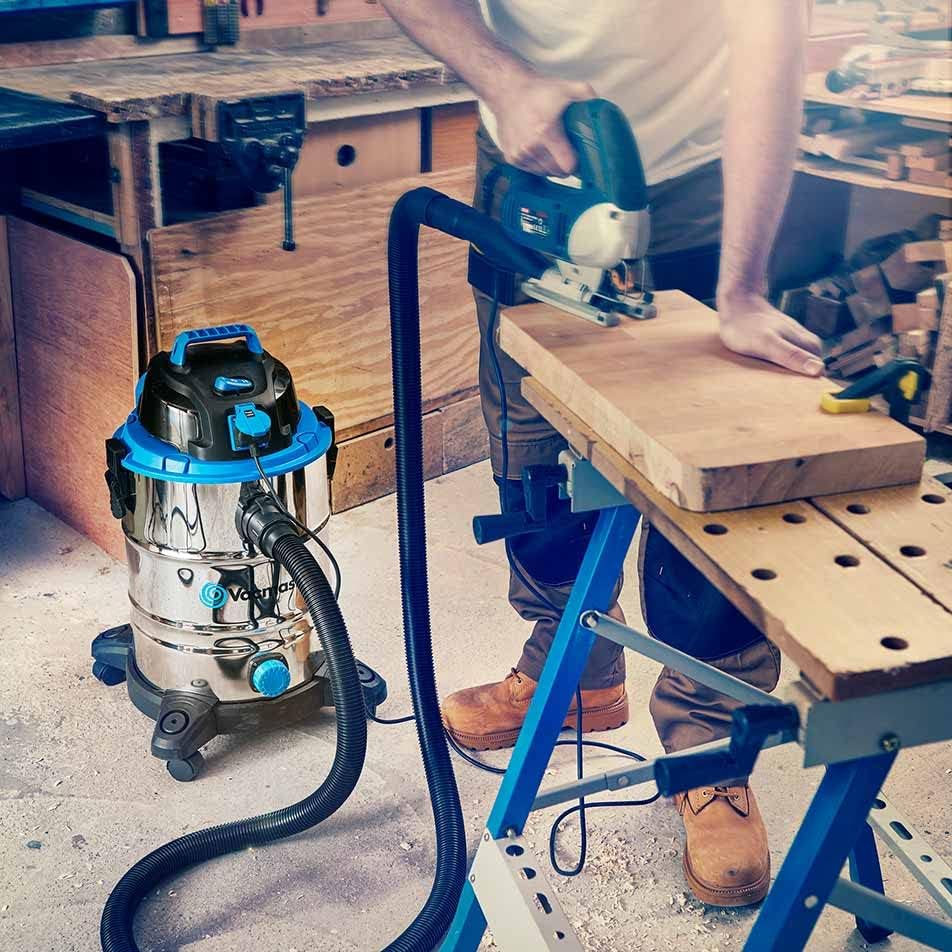 Vacmaster VQ1530SFDC vacuum connected to a power tool for dust extraction