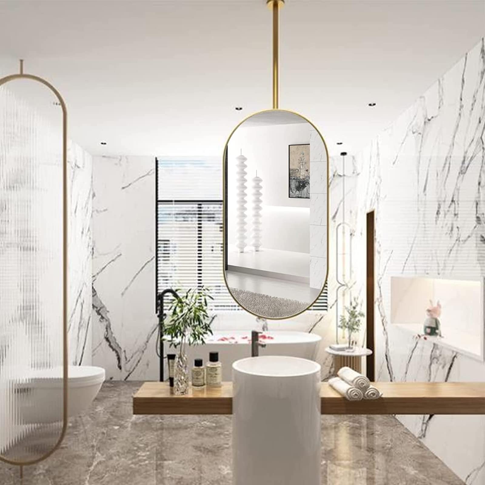 Miroir décoratif de salle de bain ovale et suspendu en métal doré