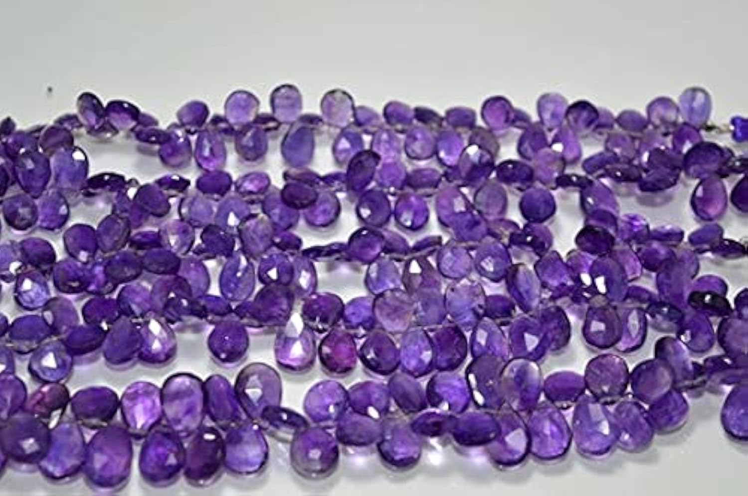 Perles d'améthyste facettées naturelles de forme poire pour créations joaillières raffinées