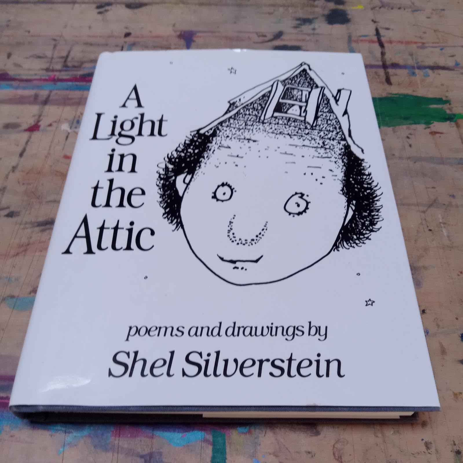 A Light in the Attic by Shel Silverstein (2005) Hardcover Hardcover – January 1, 2005