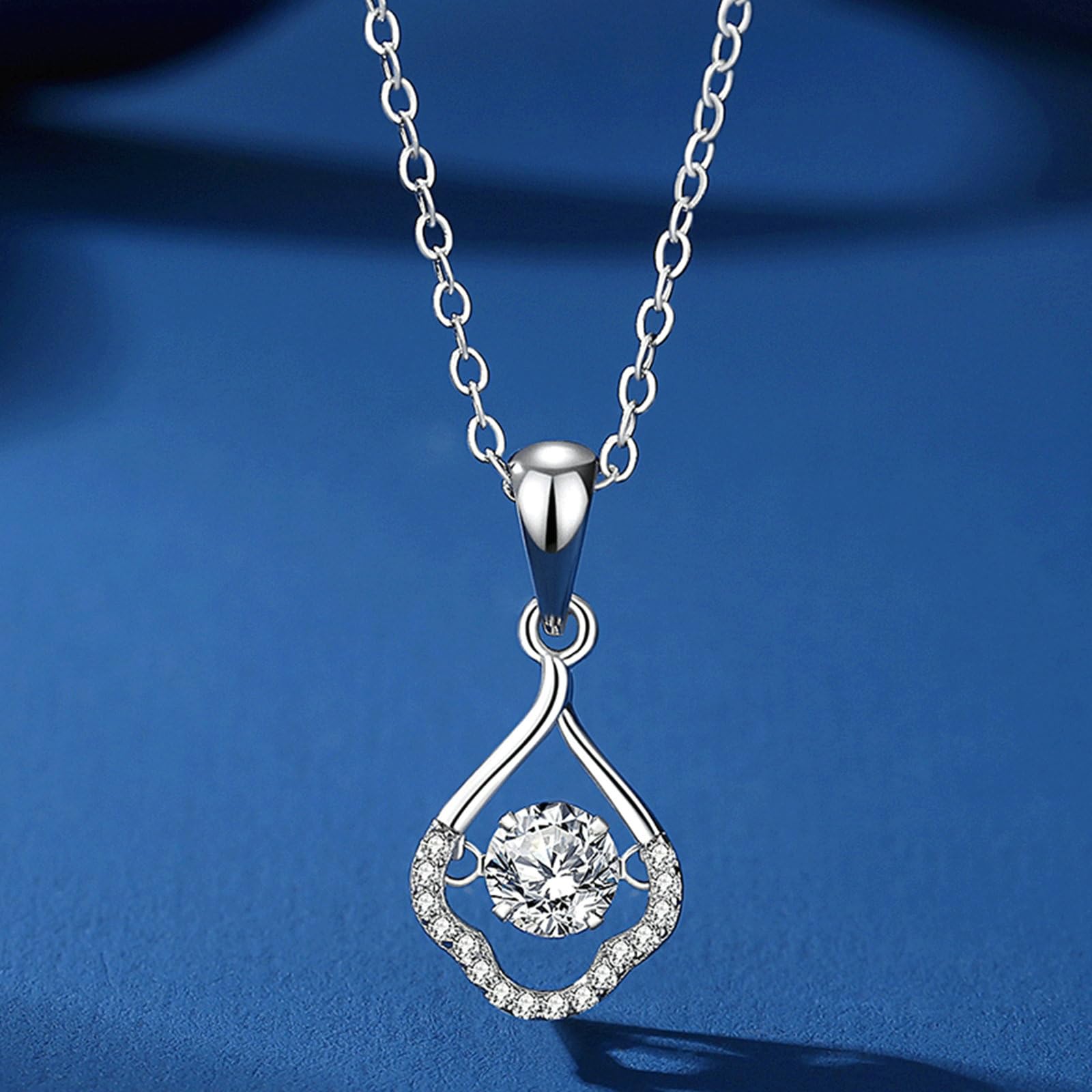 Naszyjnik damski z białego złota próby 375, zawieszka w kształcie kropli z moissanit topaz 5 mm 0,5 ct i diamentowym łańcuszkiem białe złoto 45 cm, nie zawiera niklu