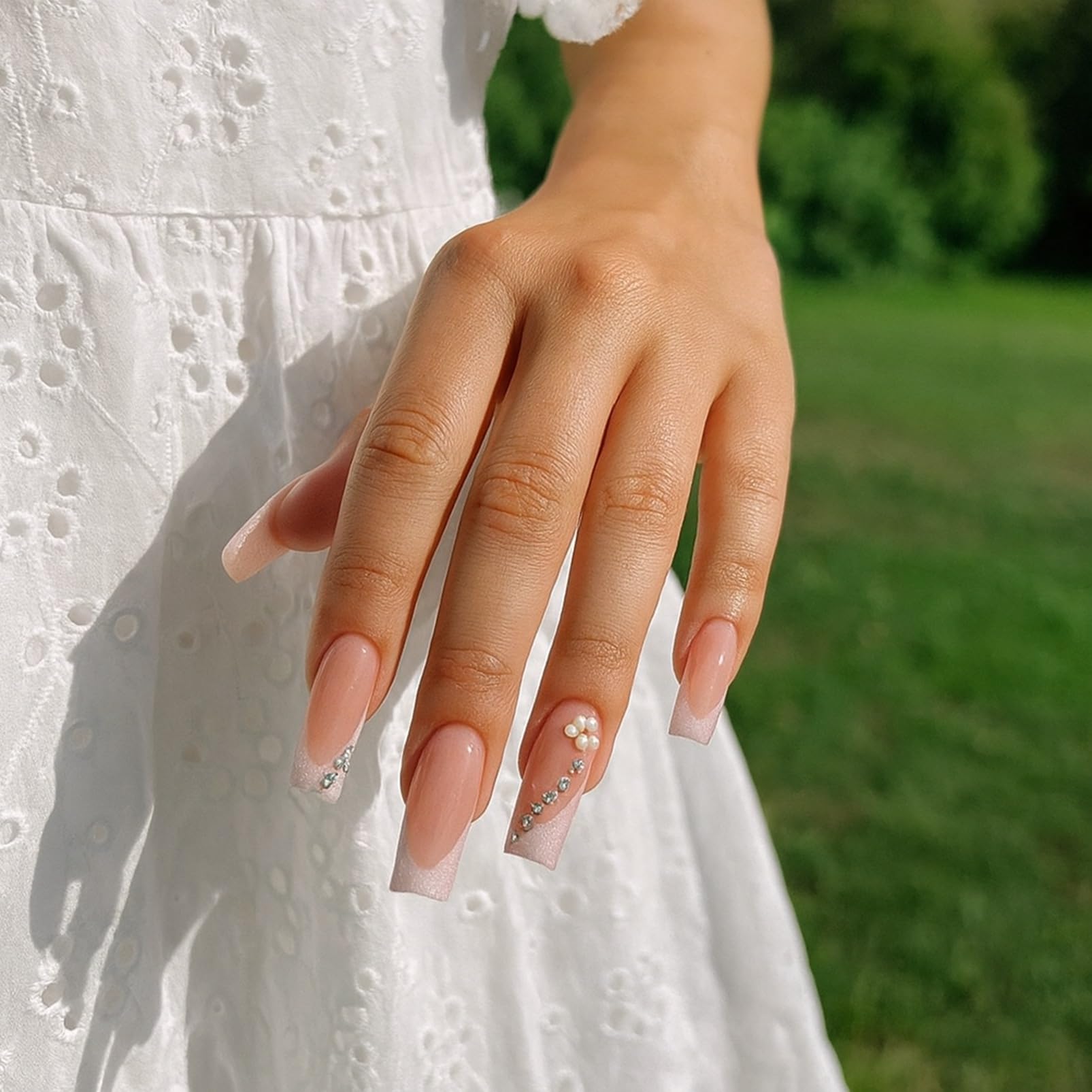 Nude Peach French Style Artificial Nail Tips with Glittery Pink Tips and Flower Rhinestone Accents - Image 2