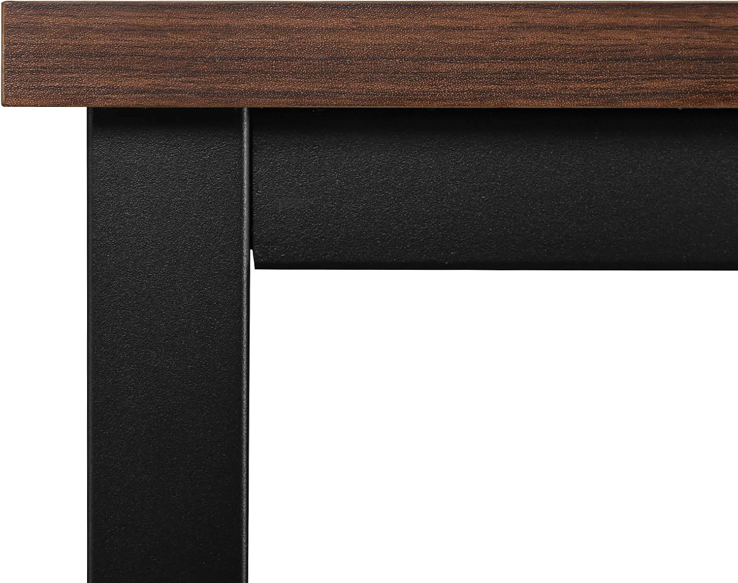 Close-up of the dark beech tabletop texture and metal frame