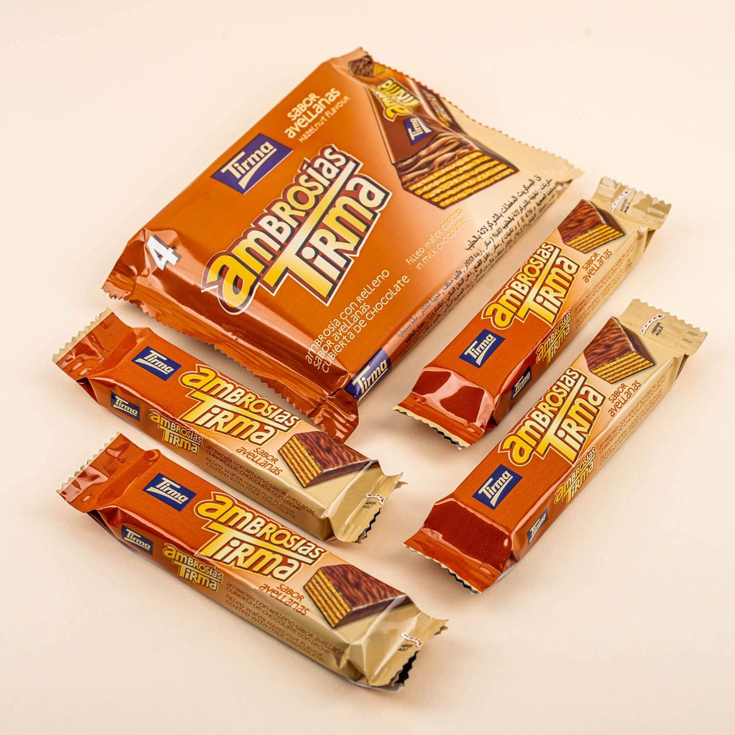 Tirma Ambrosía Chocolate con Leche y Avellanas | 4 Barritas Crujientes 86 g | Envasado Individual | Snack Vegetariano y Práctico para Llevar en Mochila o Merienda | Hecho en Canarias
