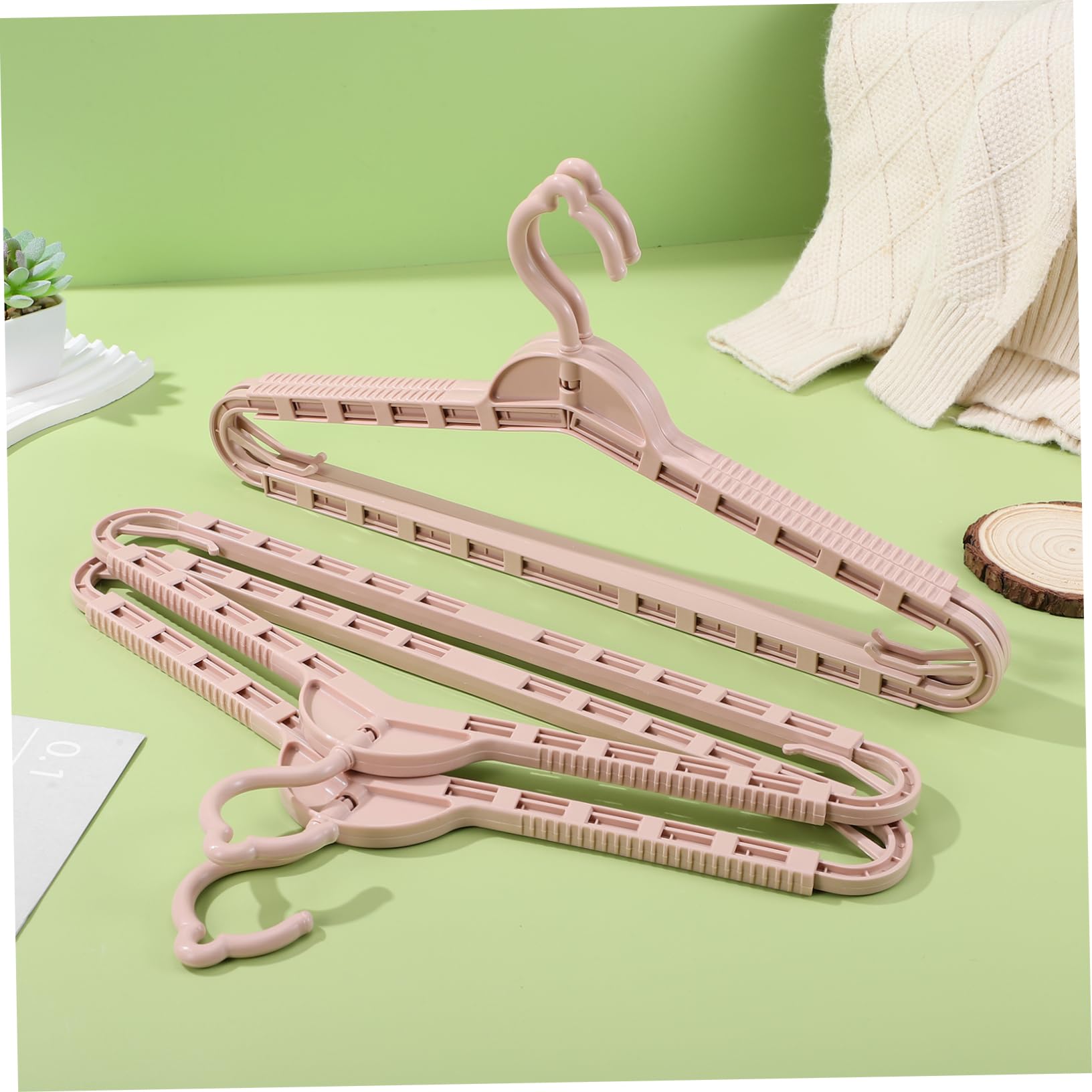 MAGICLULU Set da 8 Grucce Retrattili Regolabili in Pp Rosa, Appendiabiti Multiuso Salvaspazio Design Elegante per Armadio e Abbigliamento