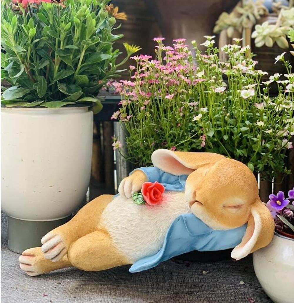 Lapin endormi en résine décorative pour embellir la cour et les massifs de fleurs