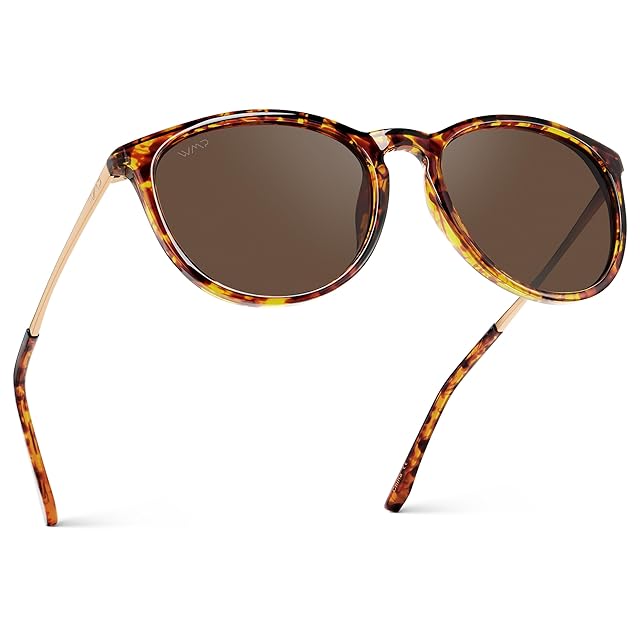 WearMe Pro Round Polarized Sunglasses for Women in gold lightweight metal alloy round frame with polarized polycarbonate lenses, displayed on a flat lay with a linen scarf and woven sun hat, the adjustable silicone nose pads visible on the inner bridge — the round vintage silhouette that has been the most-Pinterest-saved sunglass shape for women across 2024-2026 fashion-blog convergence