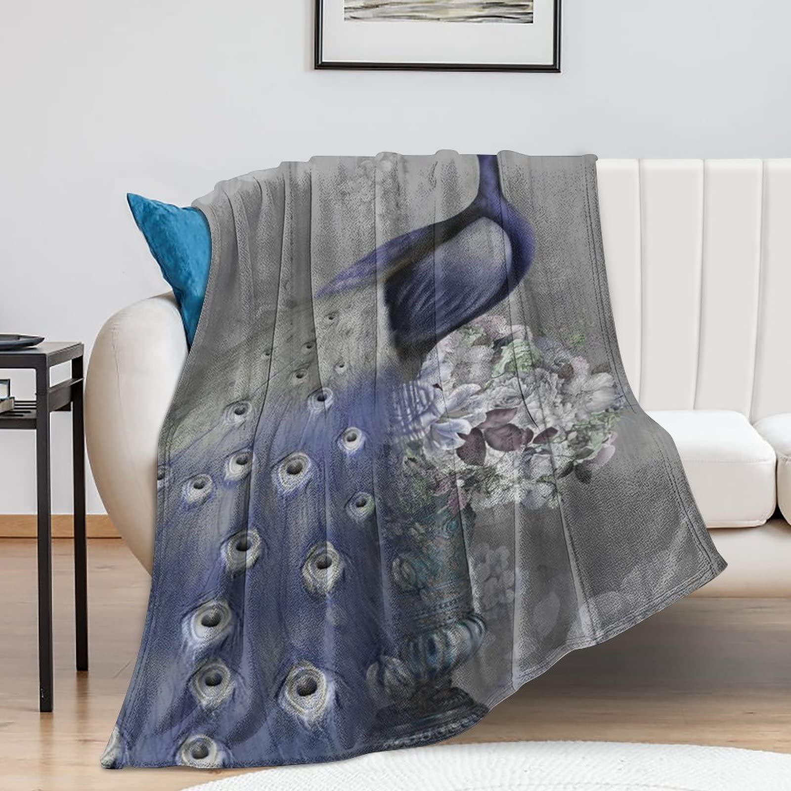 Couverture paon cadeau déco idéal pour sublimer un canapé chic
