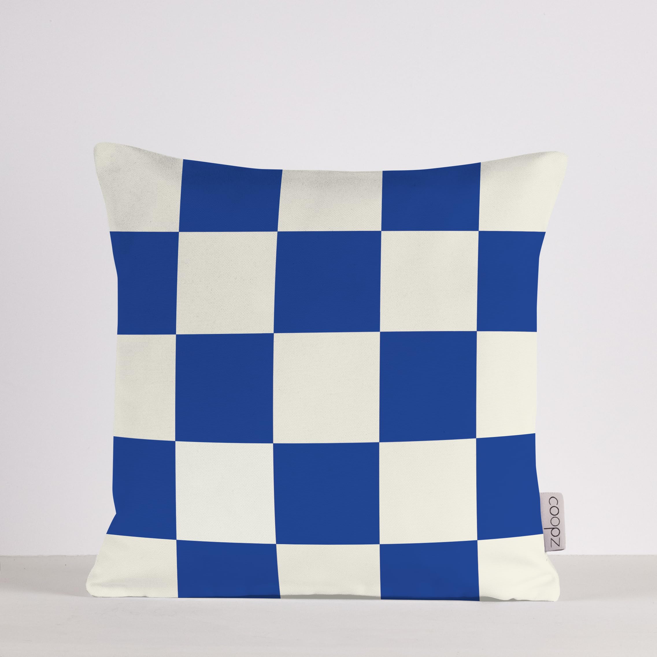 Housse de coussin fait main bleu et crème coopz pour un intérieur serein