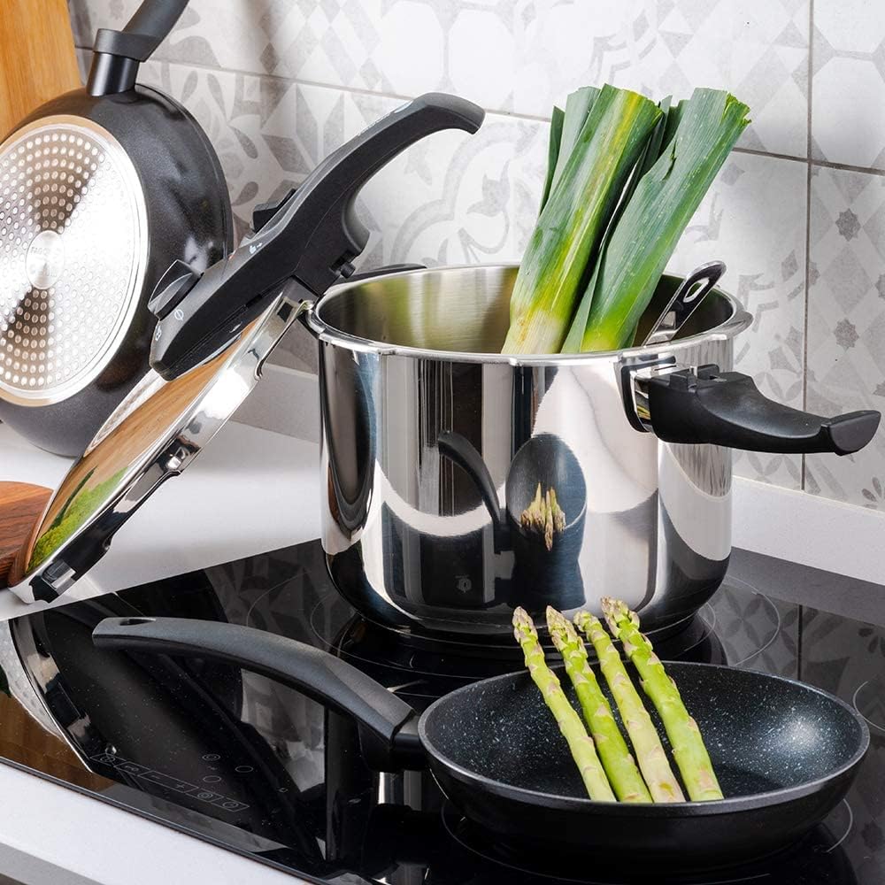 Fagor Duo Pressure Cooker on an induction hob with leeks inside, ready for cooking