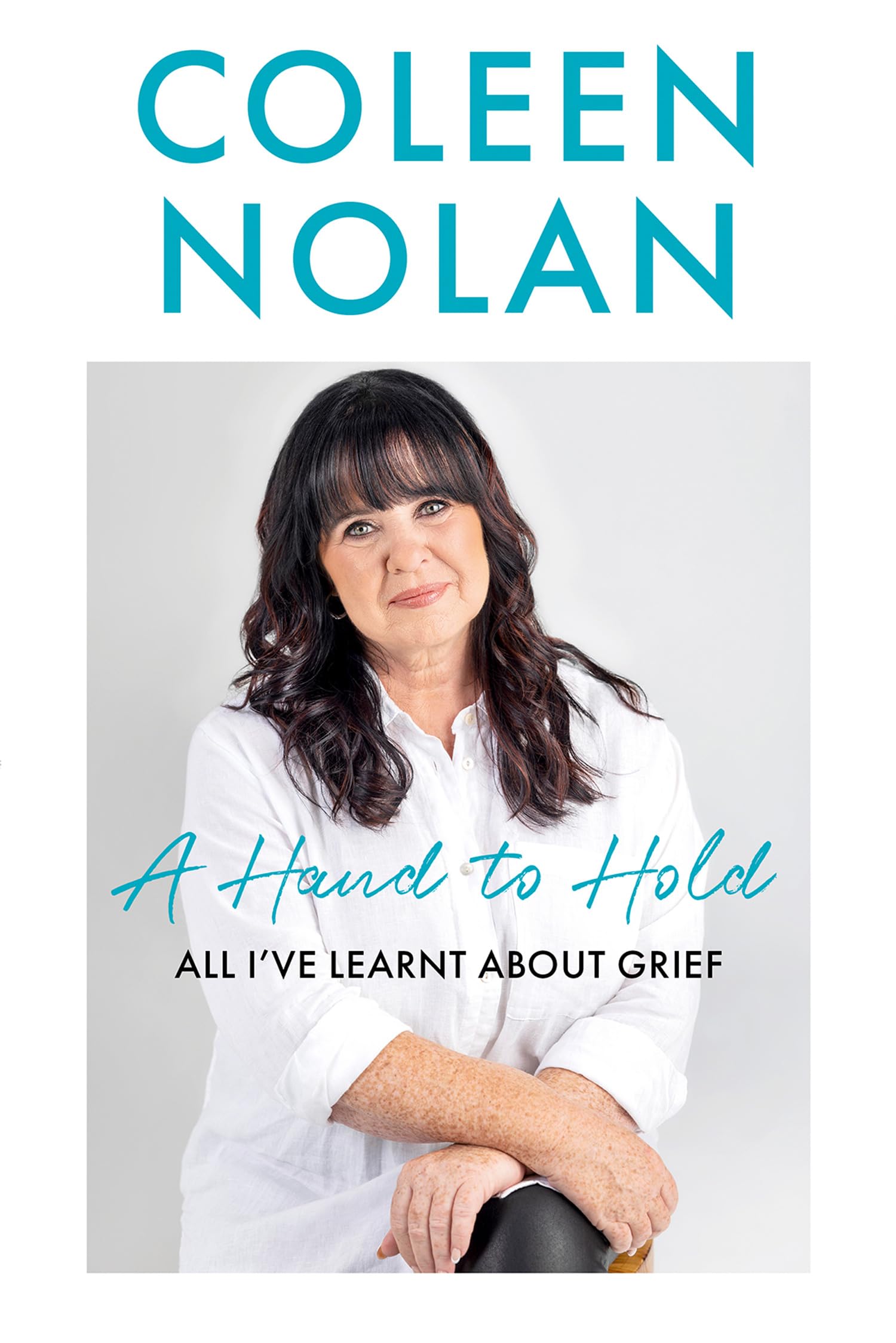 A Hand to Hold: The Sunday Times Top Ten Bestseller. A new compassionate and supportive memoir on coming to terms with loss from Loose Women’s Coleen Nolan