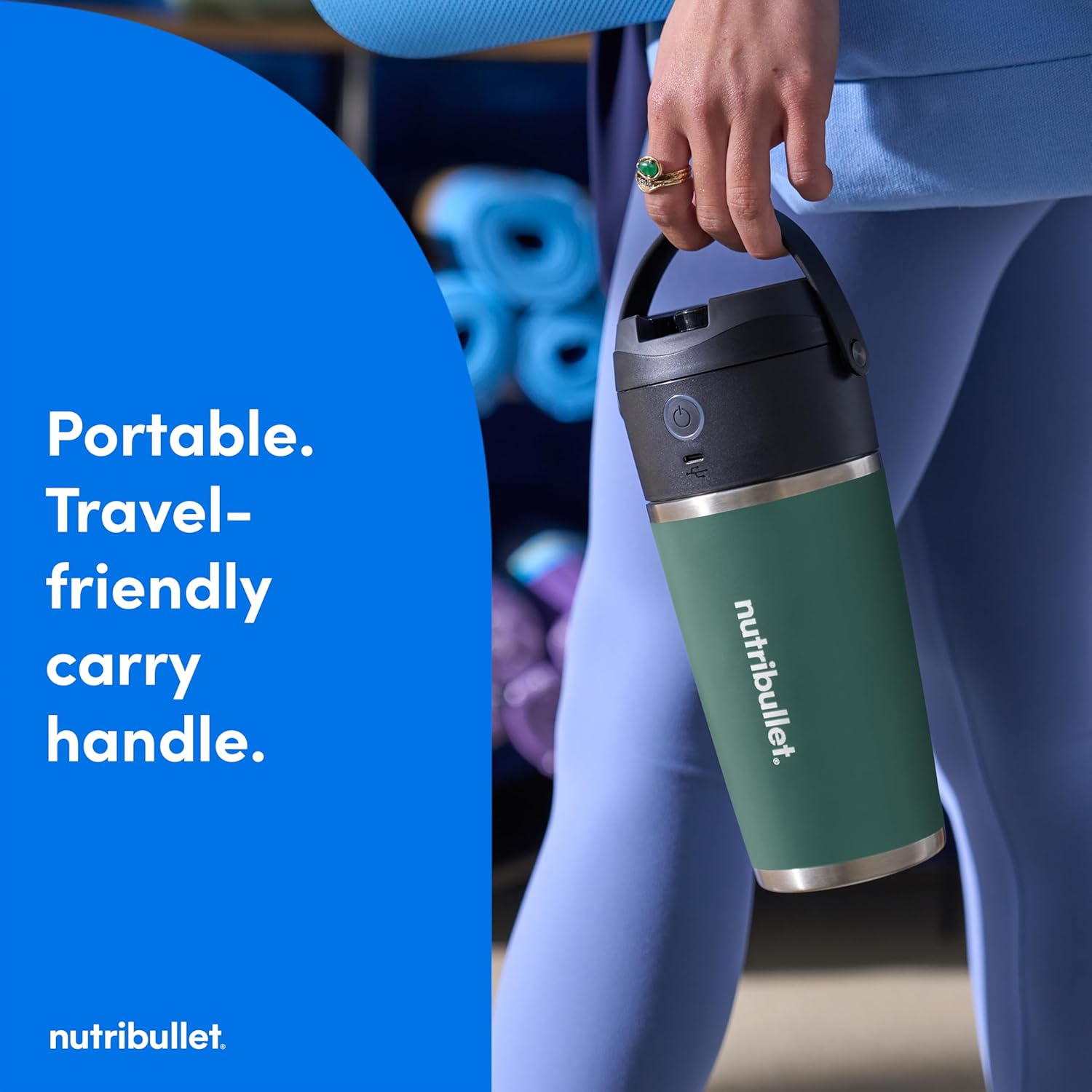 A person holding the nutribullet Flip by its carry handle, demonstrating its portability. Text overlay states 'Portable. Travel-friendly carry handle'.